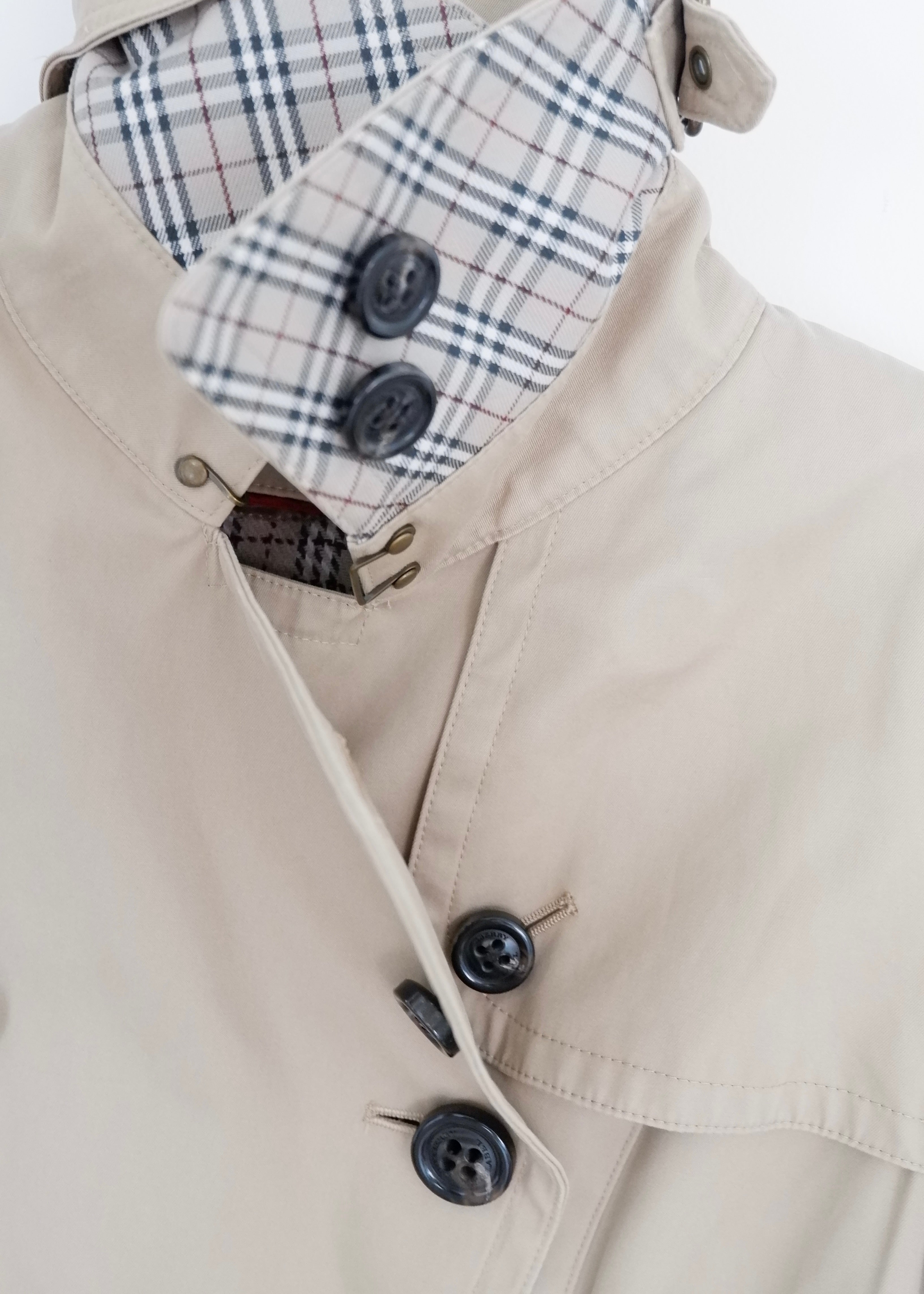 Trench-coat mi-long beige Burberry d'occasion authentique - T.S