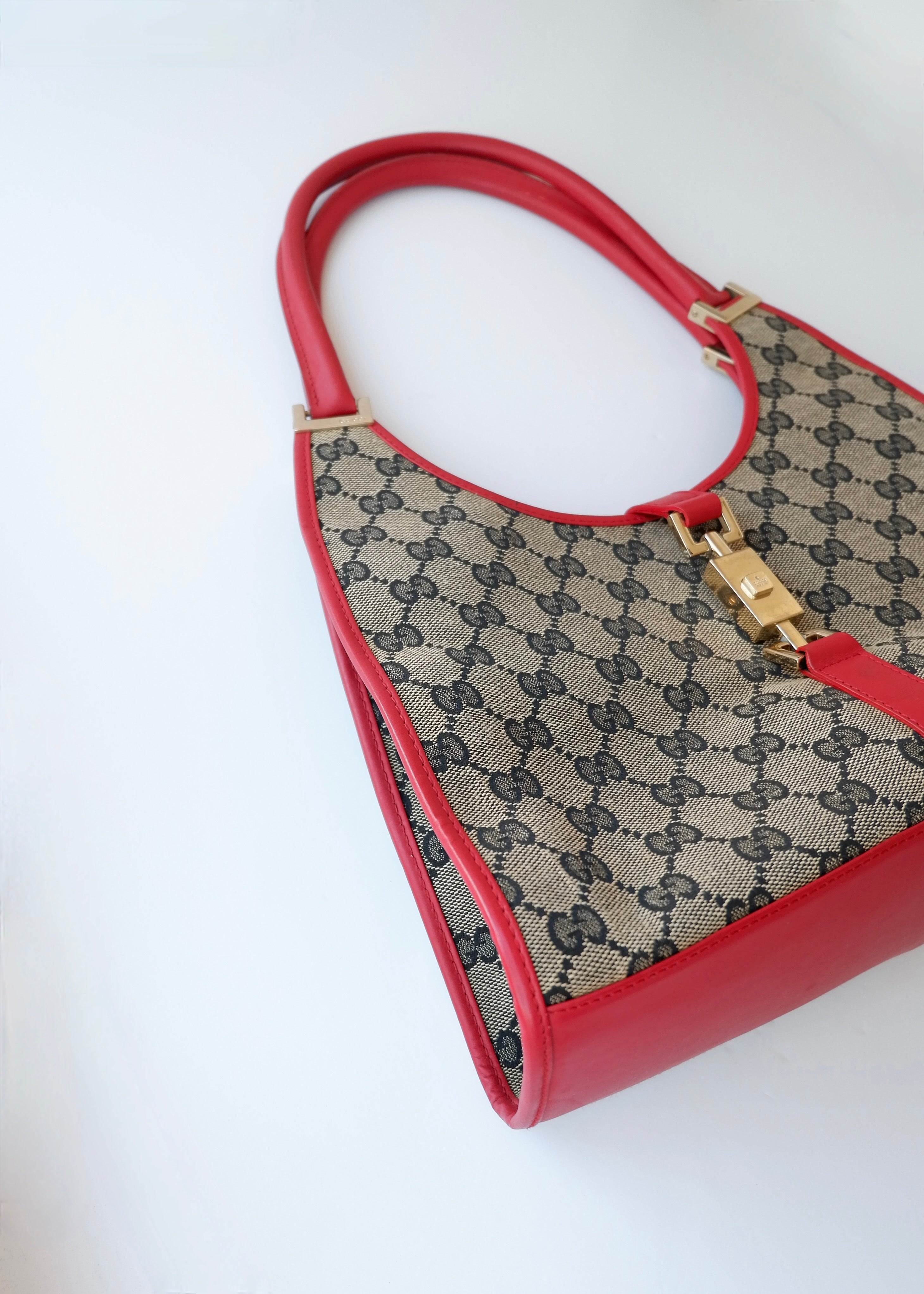 Preowned Gucci Red GG Canvas Jackie Piston Closure Shoulder Bag