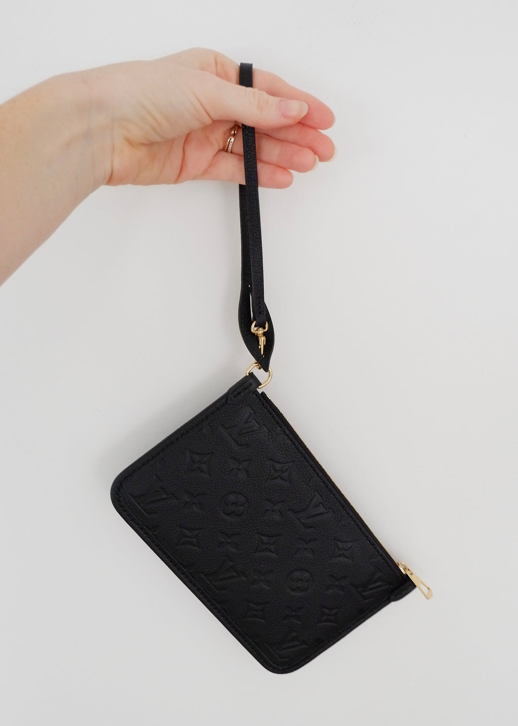 Pochette de poignet Louis Vuitton Neverfull monogramme Empreinte noir authentique d'occasion