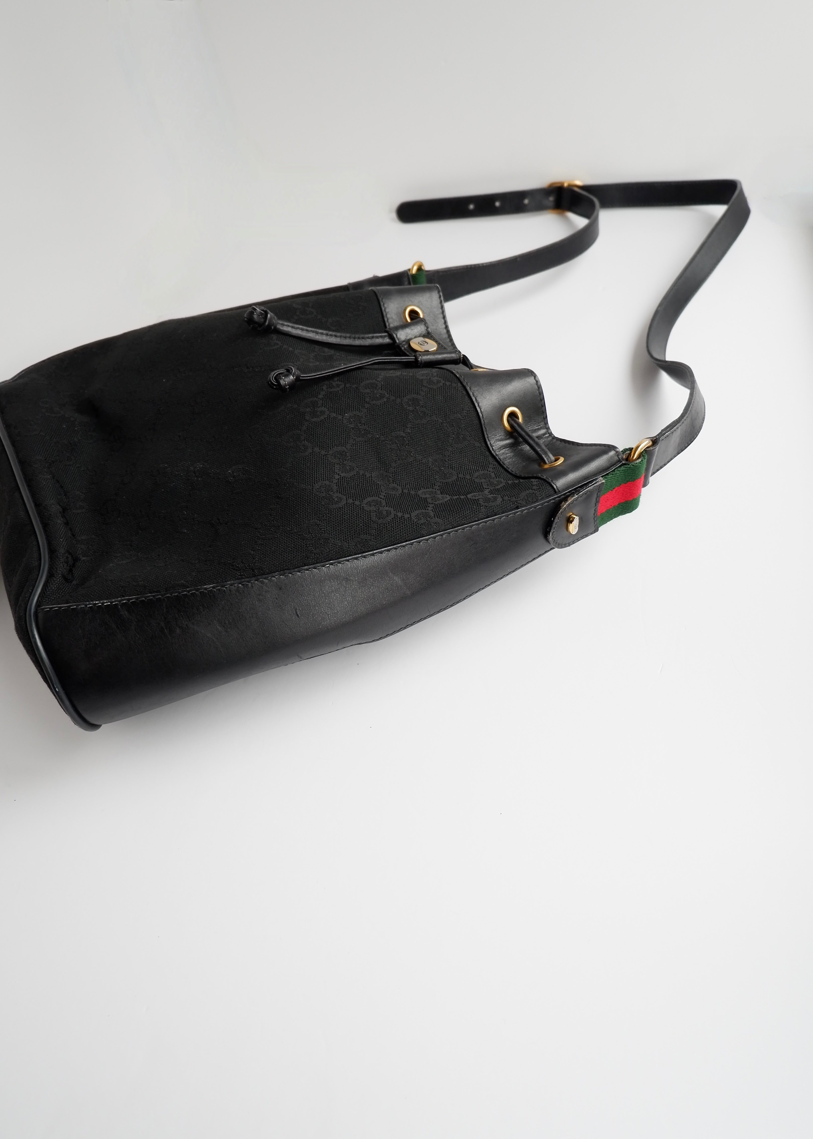 Preowned Gucci Black GG Canvas Drawstring Crossbody Bag