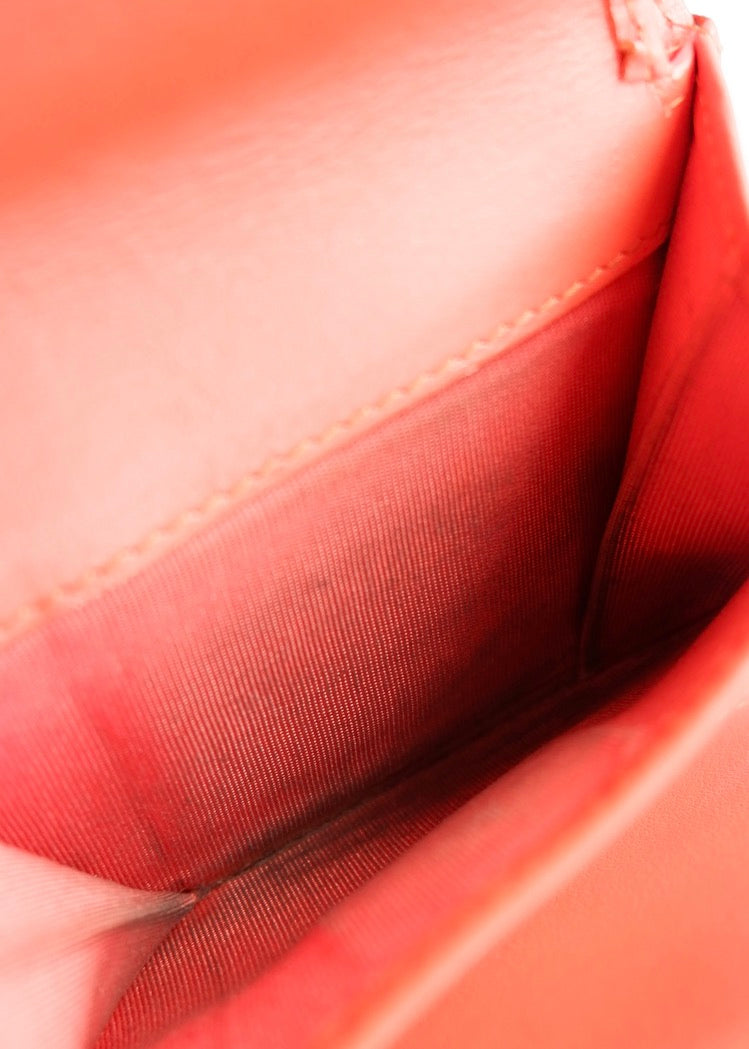 Portefeuille Chanel Boy d'occasion authentique en cuir grainé orange