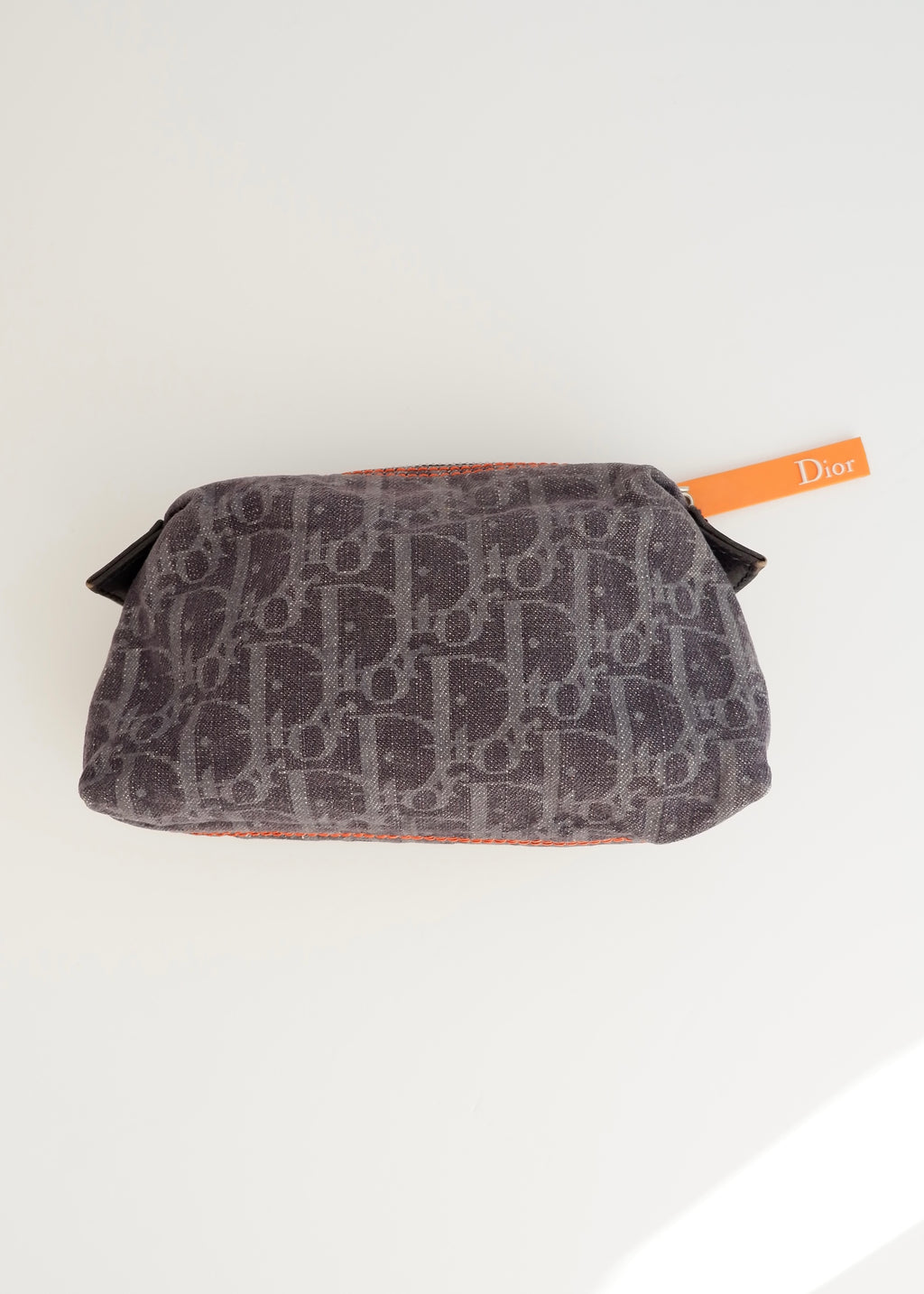 Pochette Dior en jean bleu marine motif Oblique, d'occasion et authentique