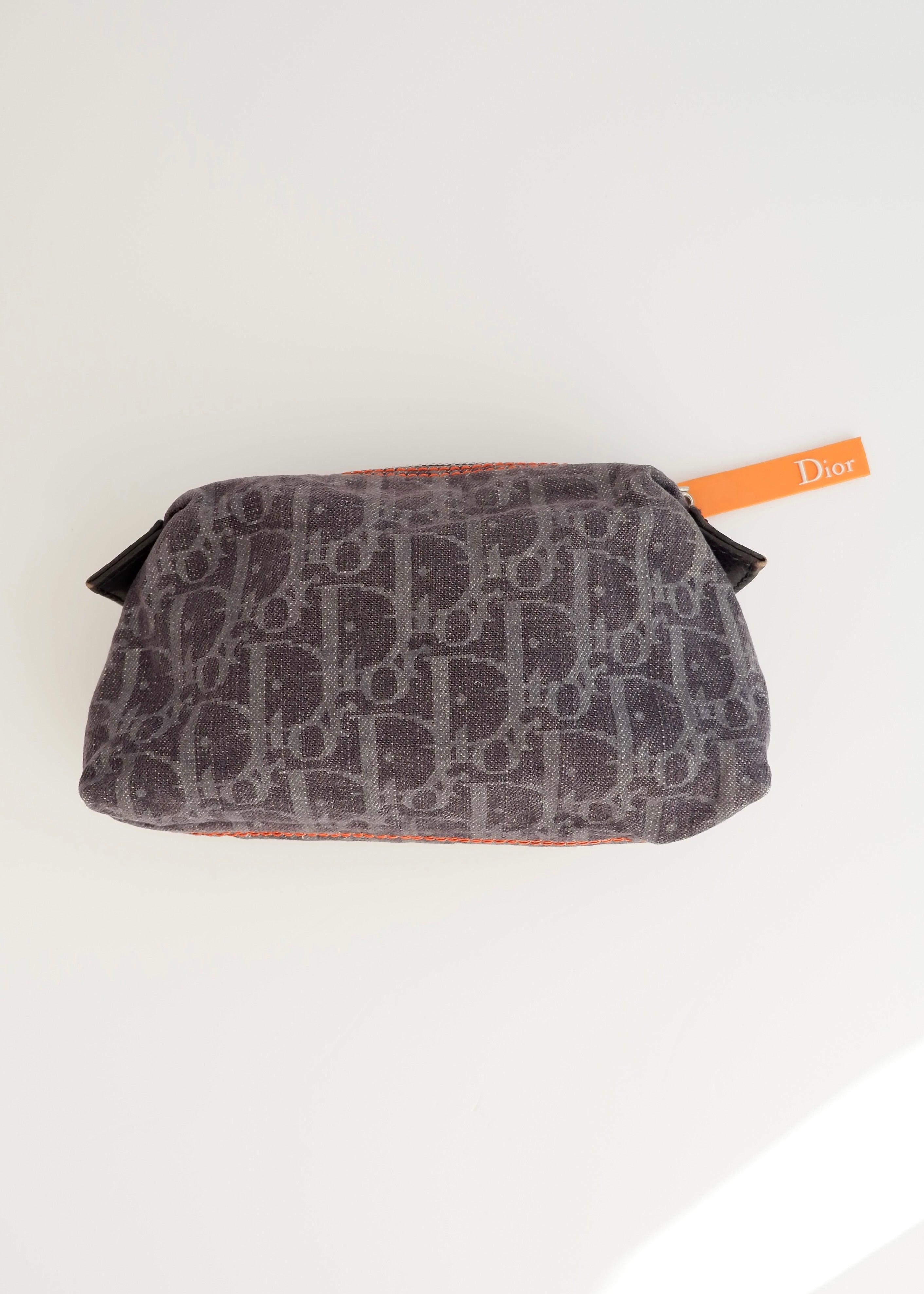 Pochette Dior en jean bleu marine motif Oblique, d'occasion et authentique