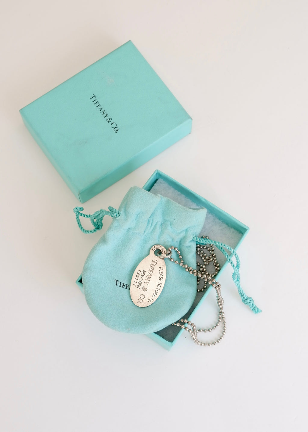Authentique collier long chaîne avec pendentif plaque militaire Tiffany & Co. en argent d'occasion