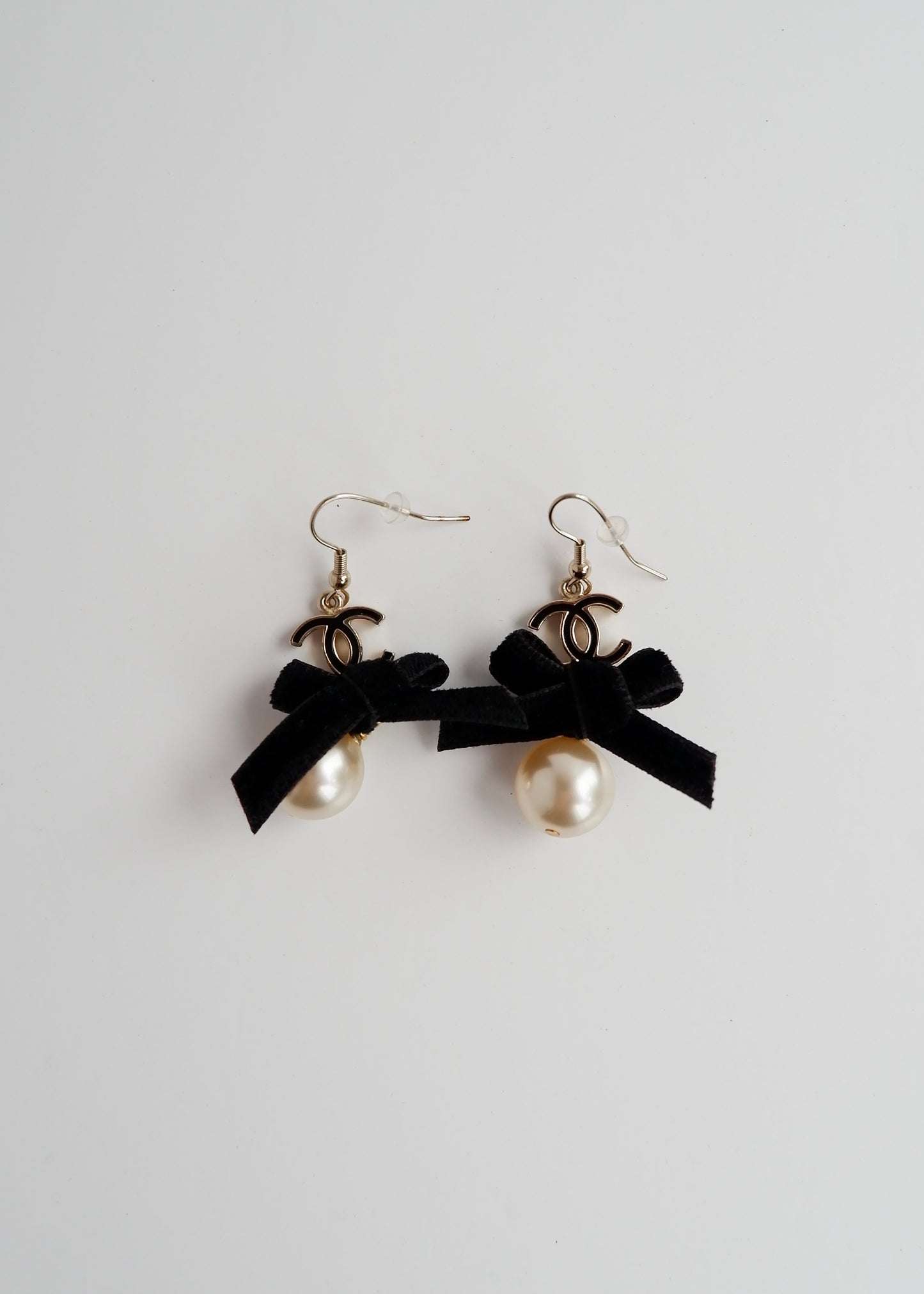 Authentic Preowned Chanel Black/ Gold CC Logo Bow Detail Drop Pearl Earings