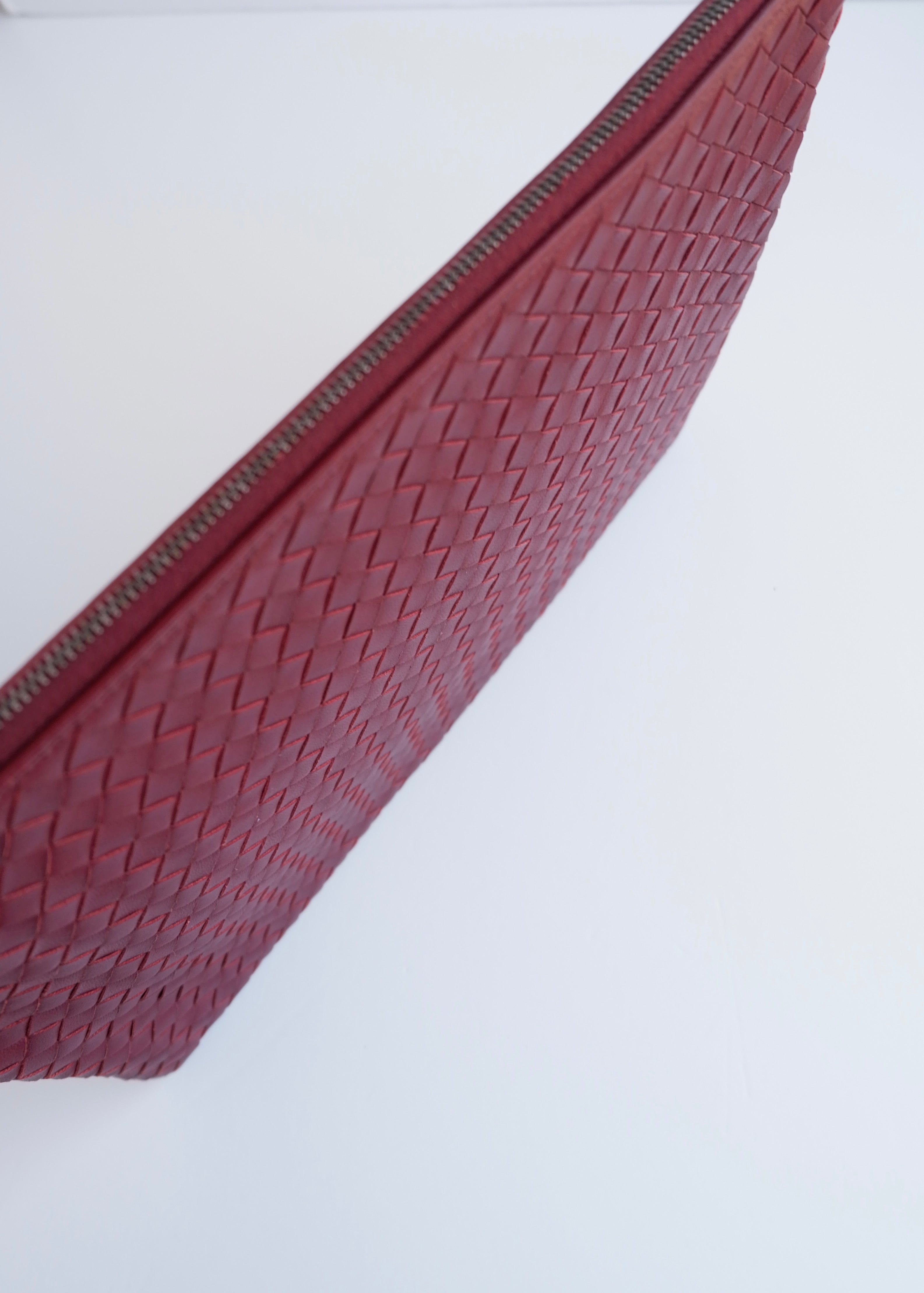 Authentic Prowned Bottega Veneta Burgundy Leather Woven Pouch