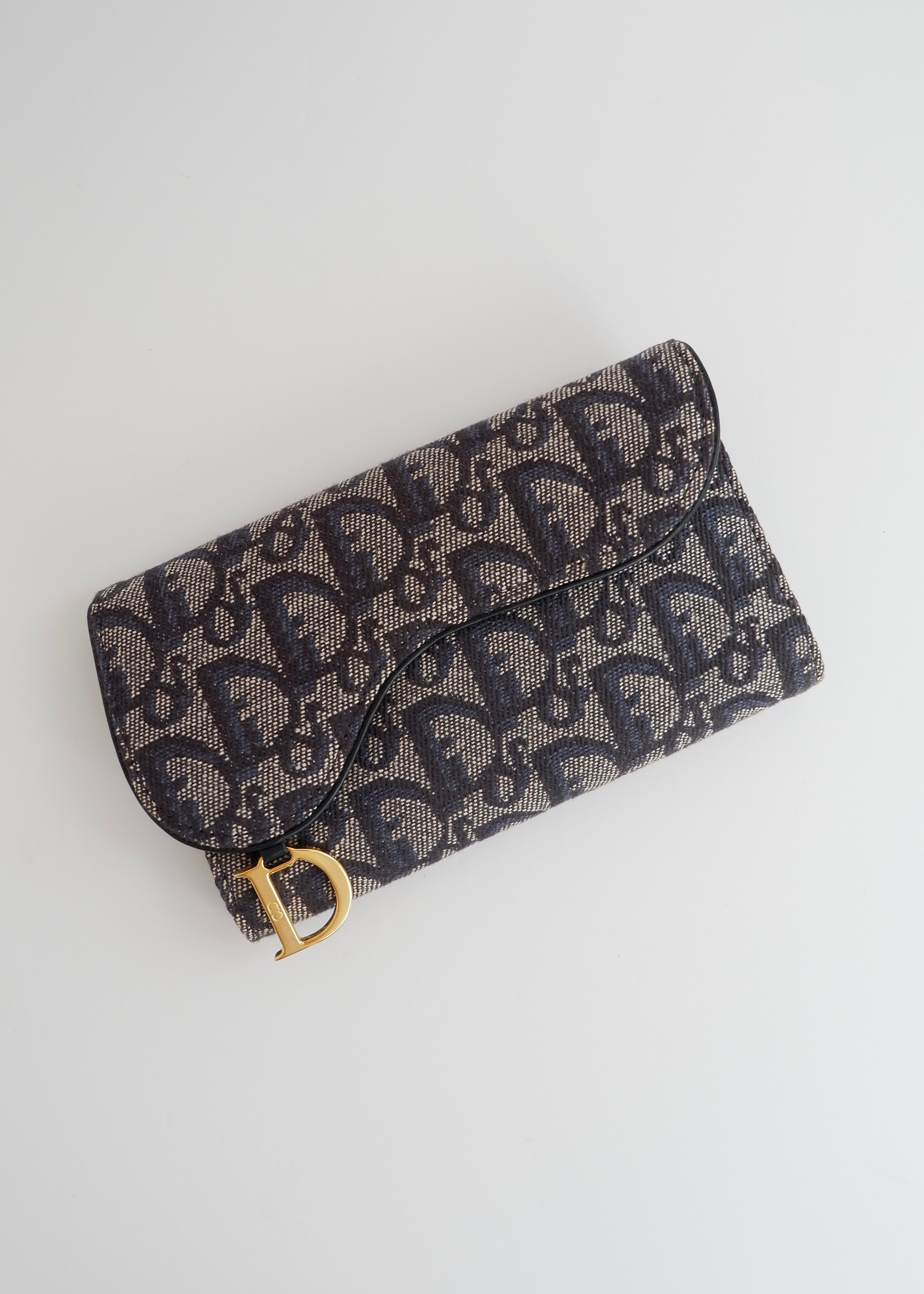 Portefeuille Dior authentique d'occasion en toile trotteur bleu marine