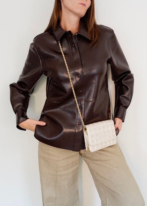 Sac Chanel d'occasion authentique en toile dorée New Travel Line WOC