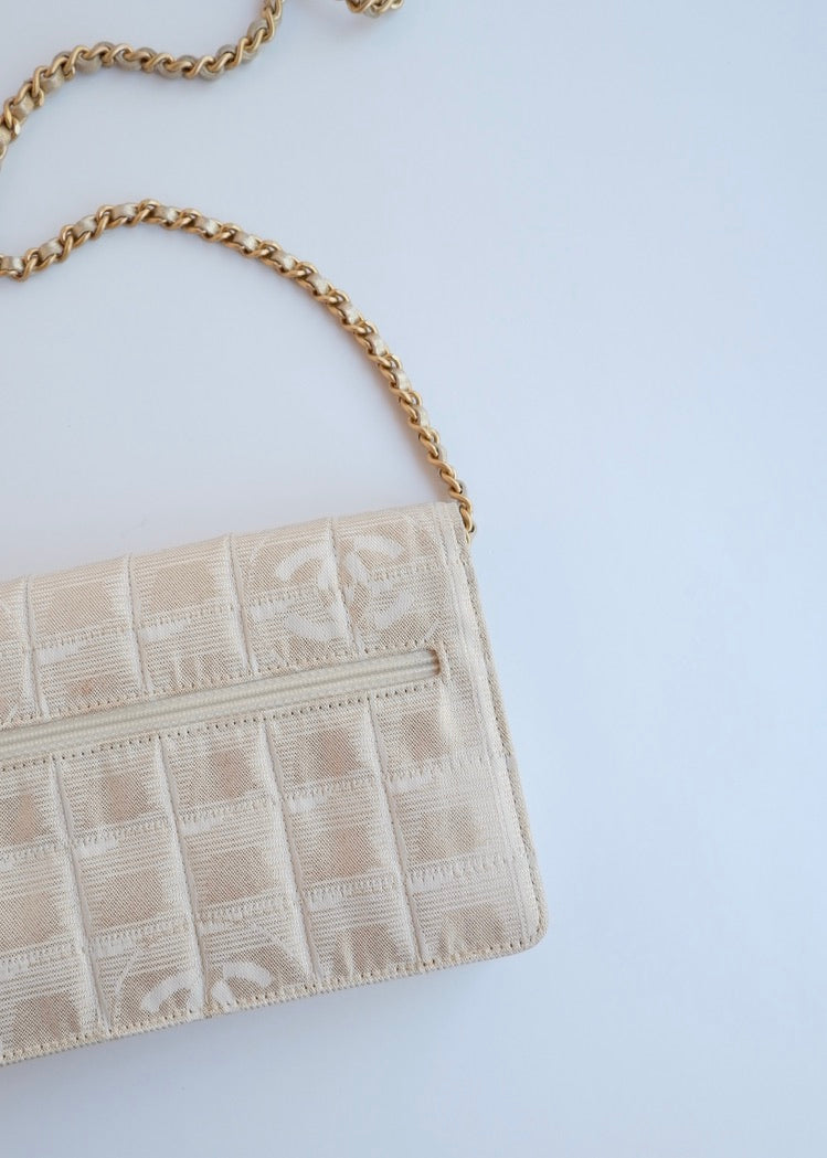 Authentic Preowned Chanel Gold Canvas New Travel Line WOC Bag