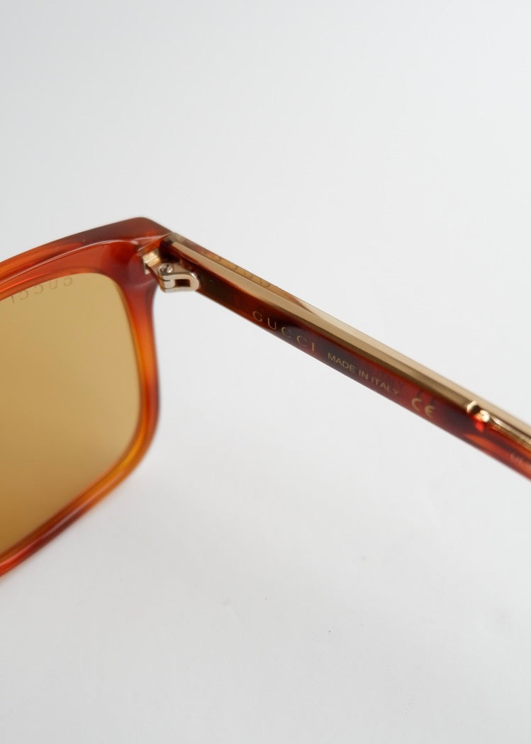Authentiques Lunettes de soleil Gucci d'occasion en acétate marron à monture carrée