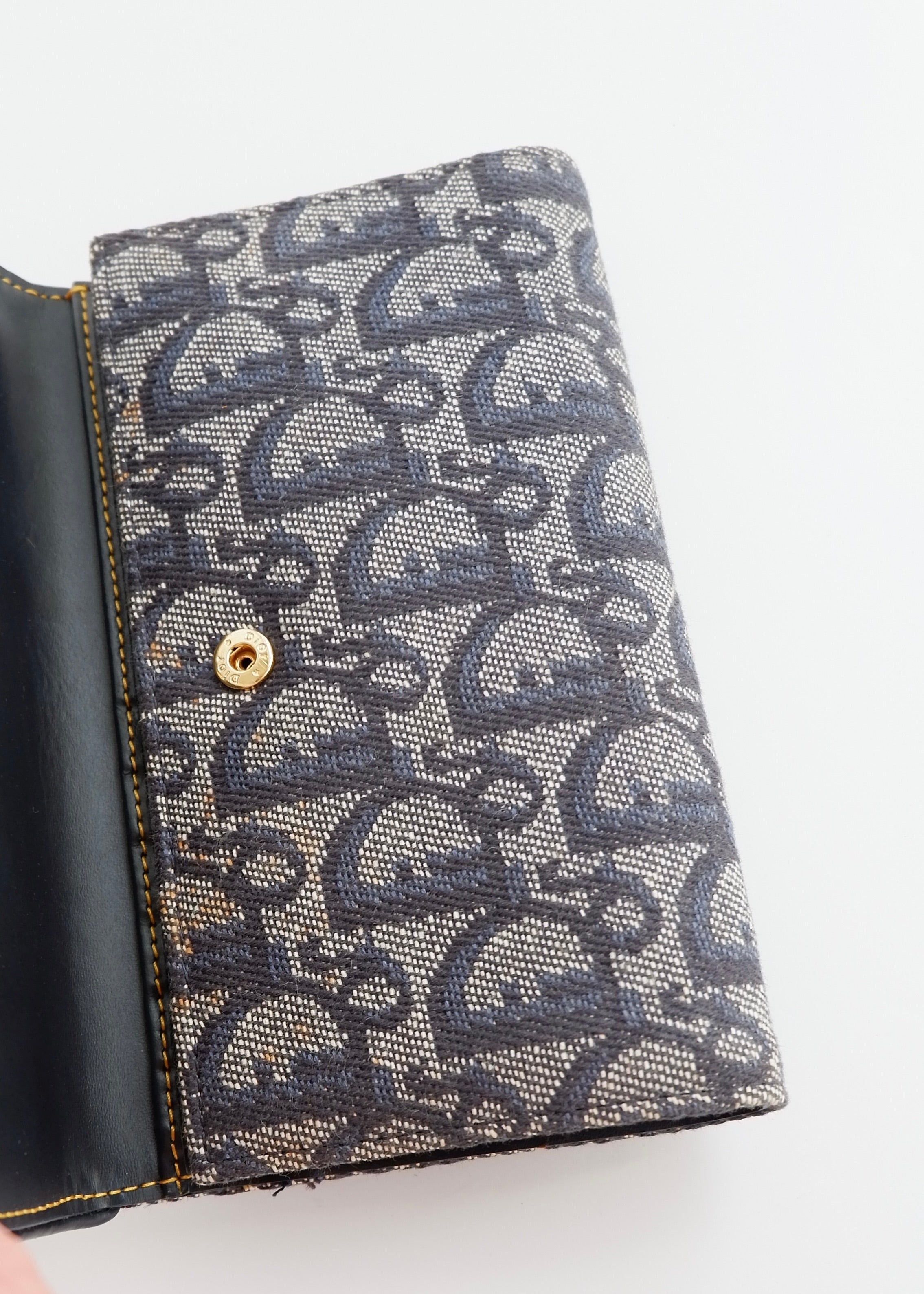 Portefeuille Dior authentique d'occasion en toile trotteur bleu marine
