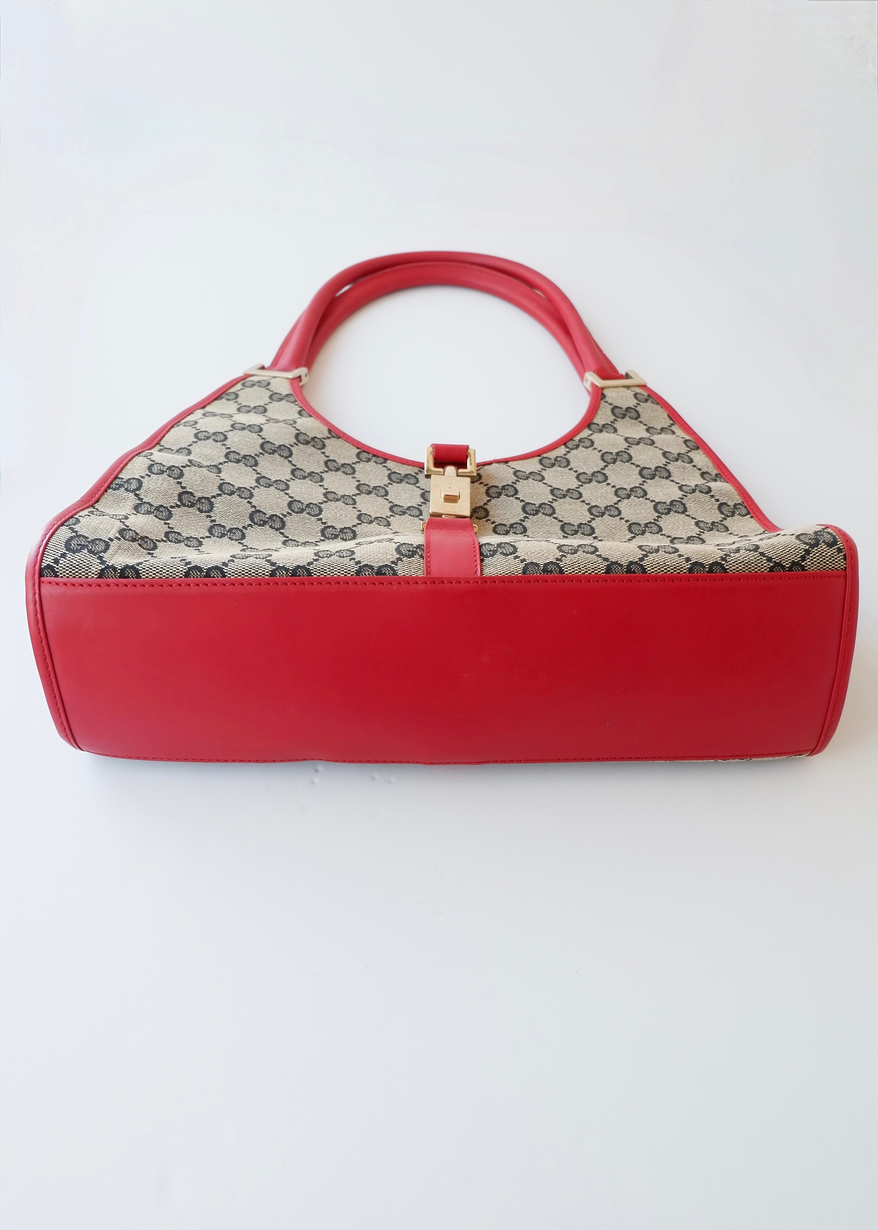 Preowned Gucci Red GG Canvas Jackie Piston Closure Shoulder Bag