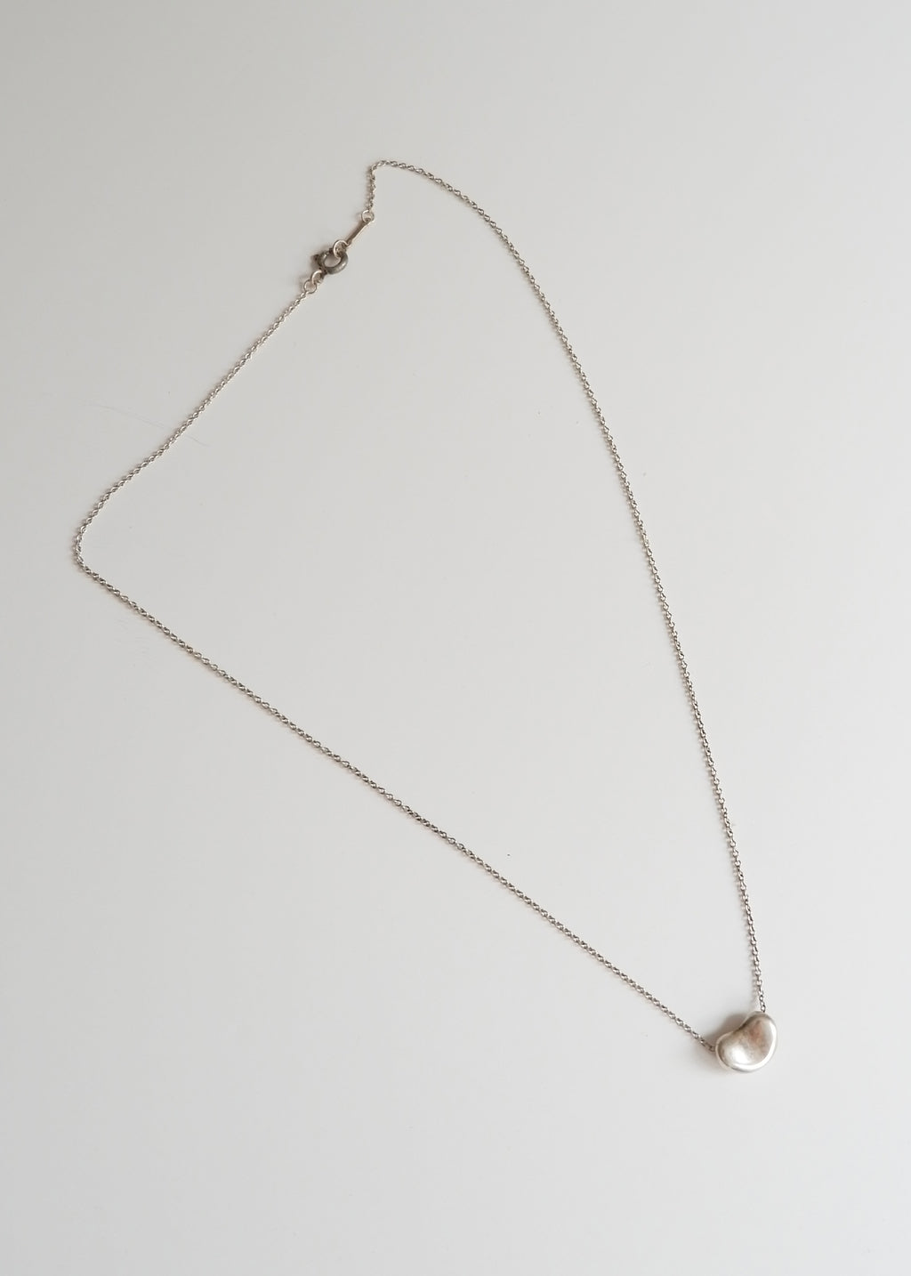 Authentique collier Tiffany en argent avec pendentif haricot d'occasion