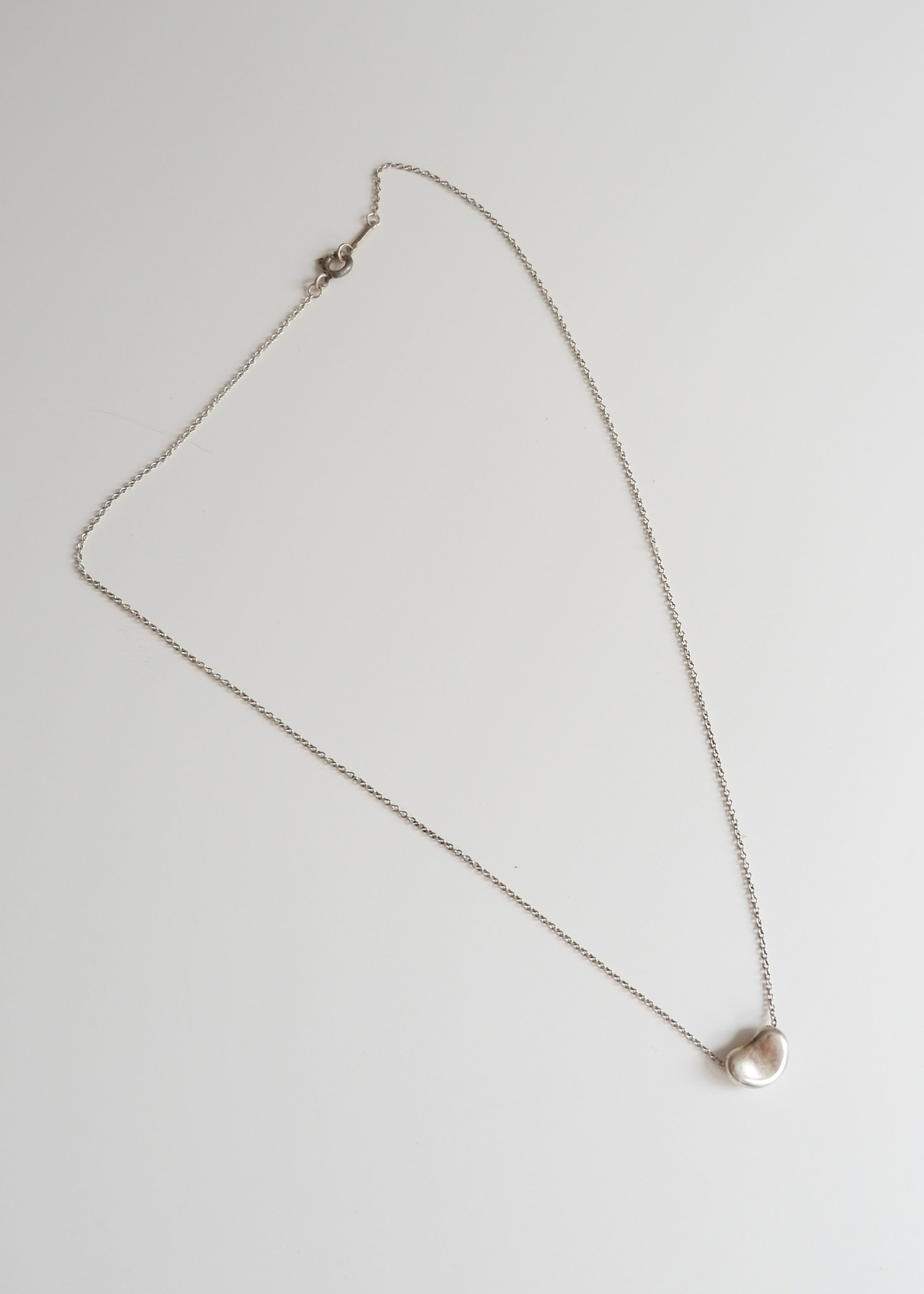 Authentique collier Tiffany en argent avec pendentif haricot d'occasion