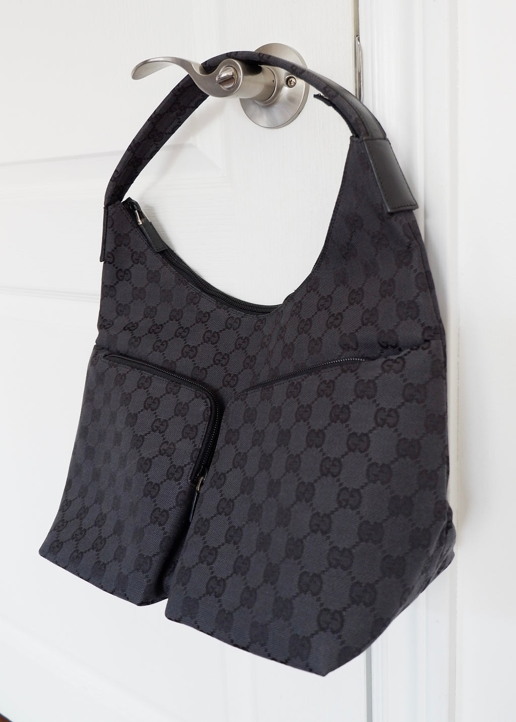 Authentique Sac à bandoulière Gucci en toile GG noire d'occasion
