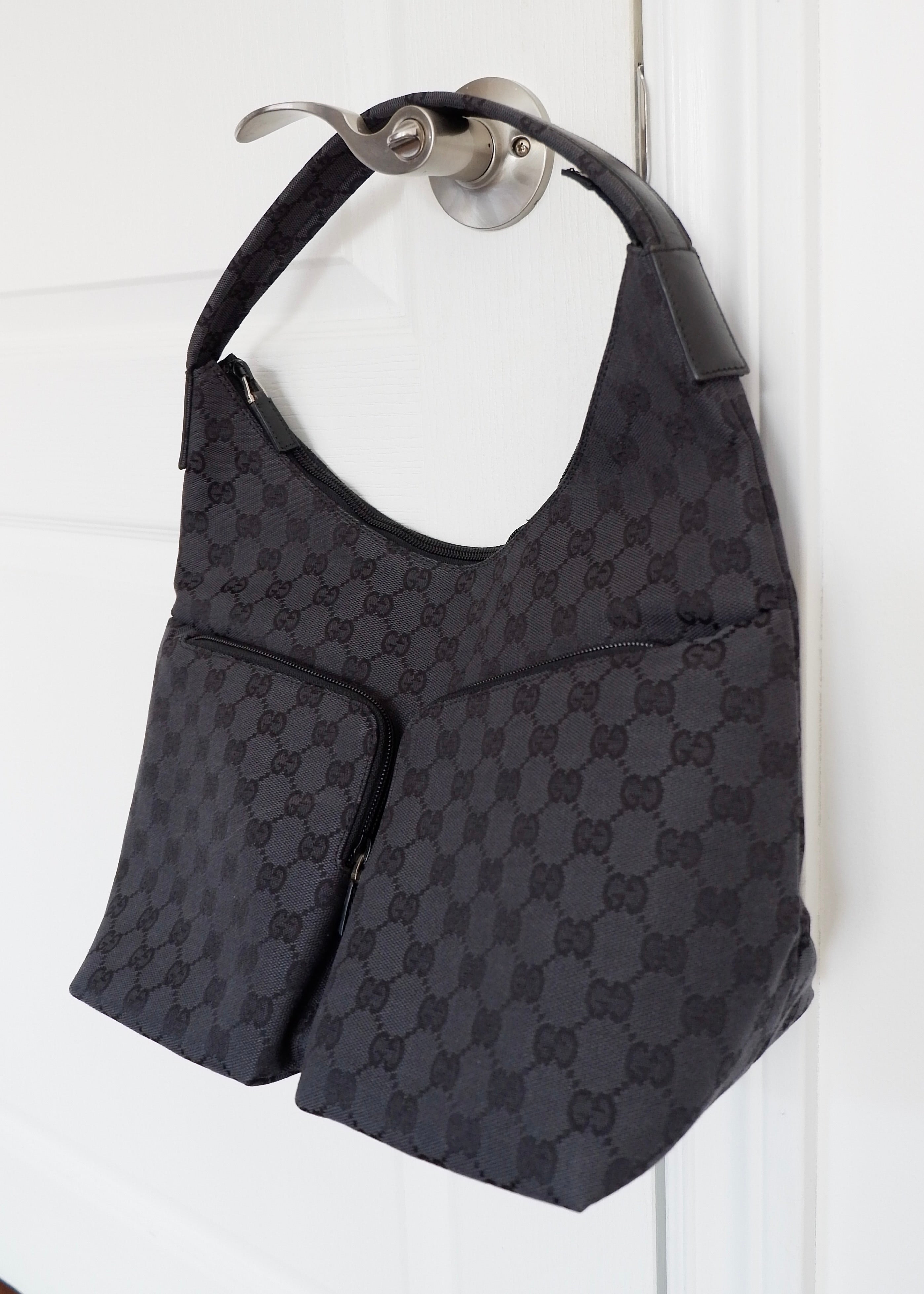 Authentique Sac à bandoulière Gucci en toile GG noire d'occasion