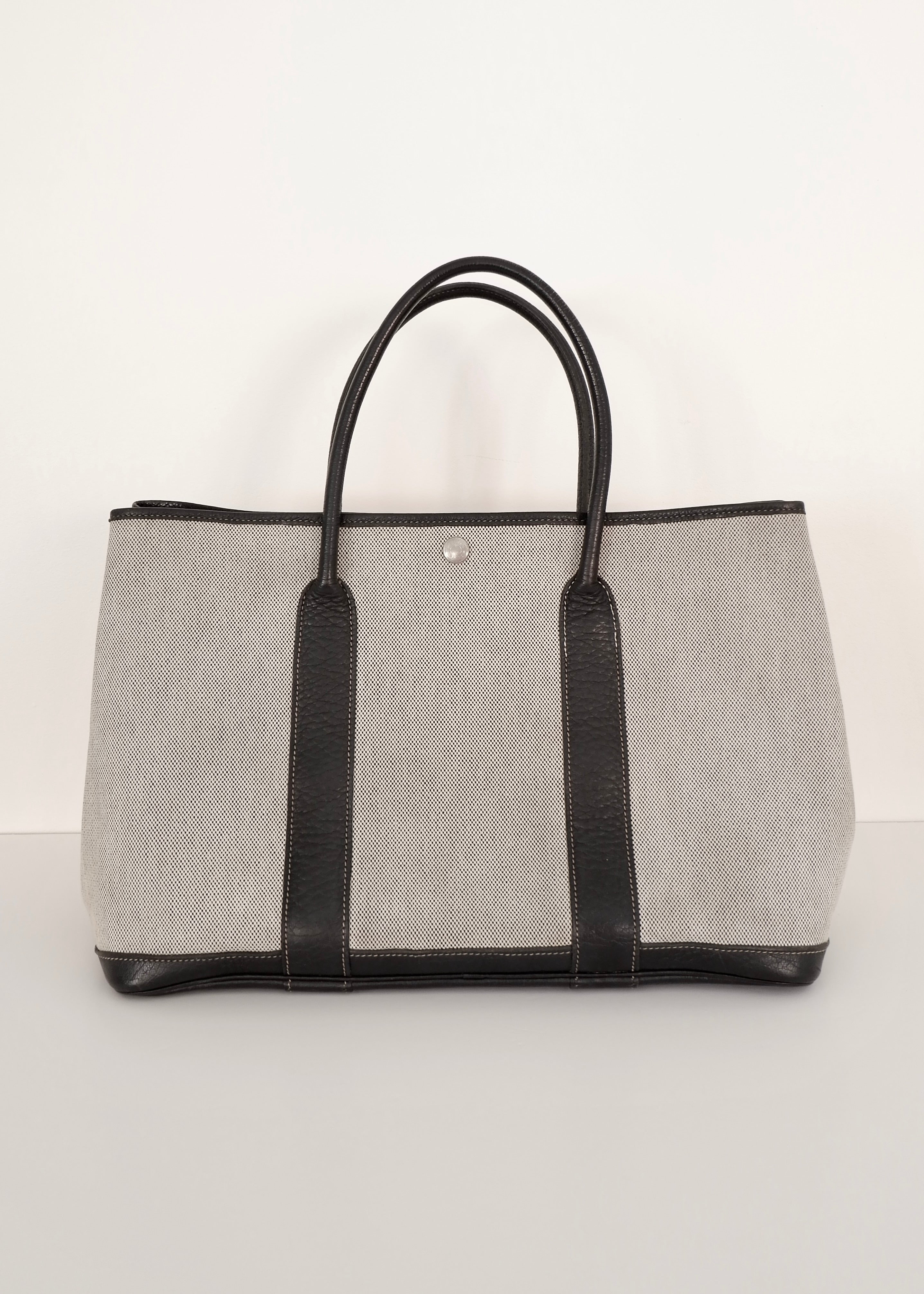Sac cabas Hermès Garden Party authentique d'occasion en cuir et toile noirs/gris