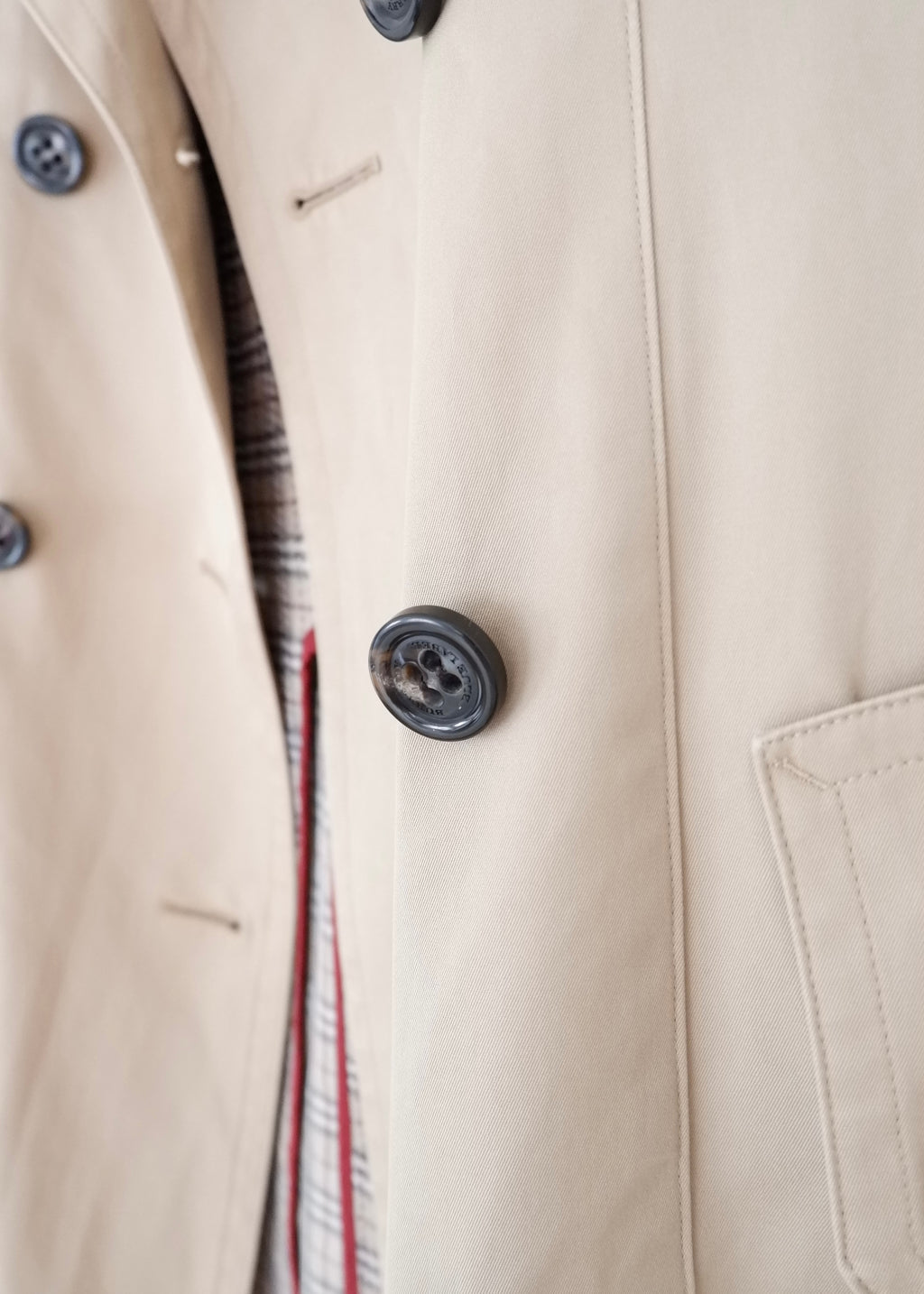 Trench-coat mi-long beige Burberry d'occasion authentique - T.S