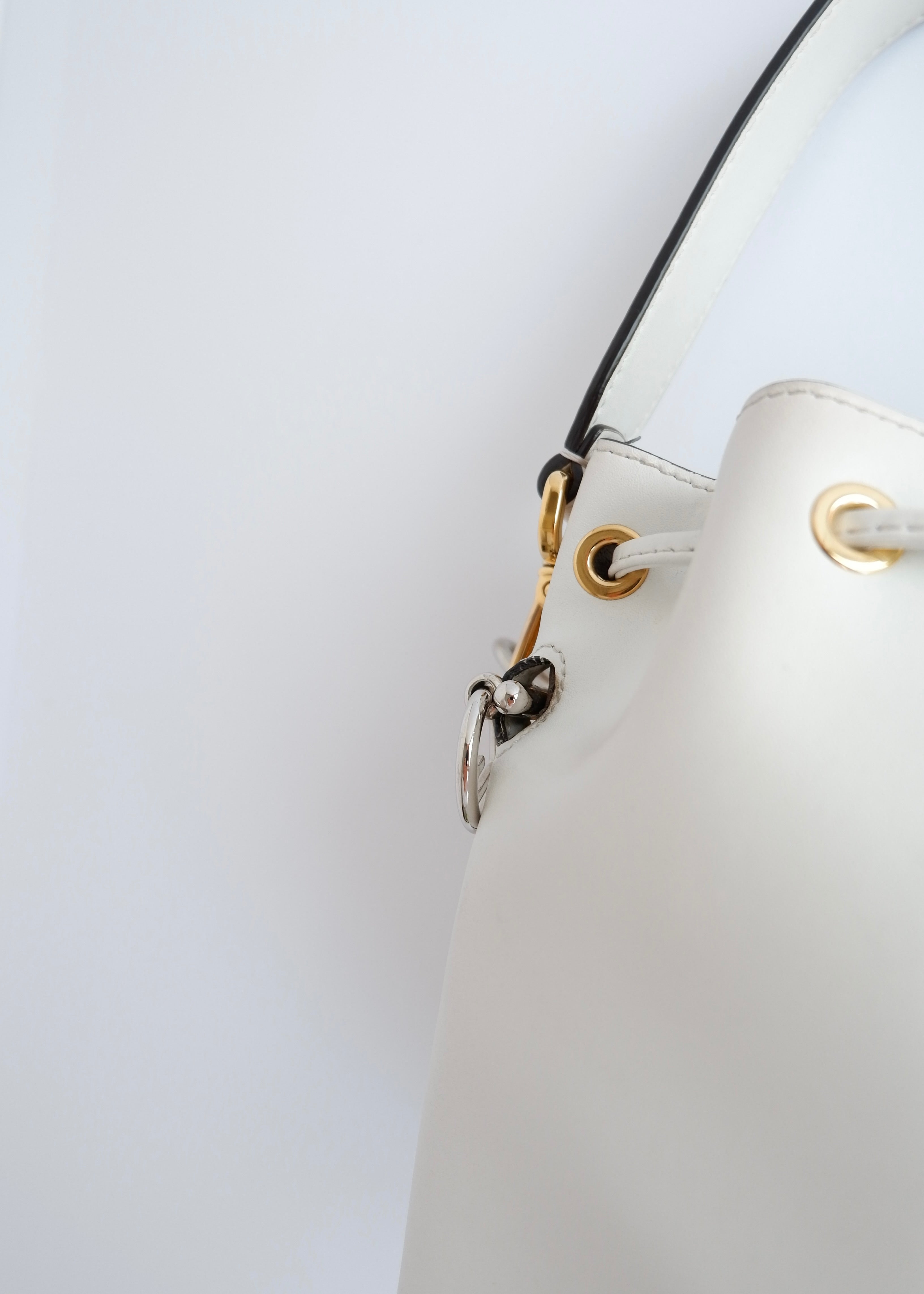 Authentic Preowned Fendi White Leather Zucca Studded Drawstring Bucket Bag