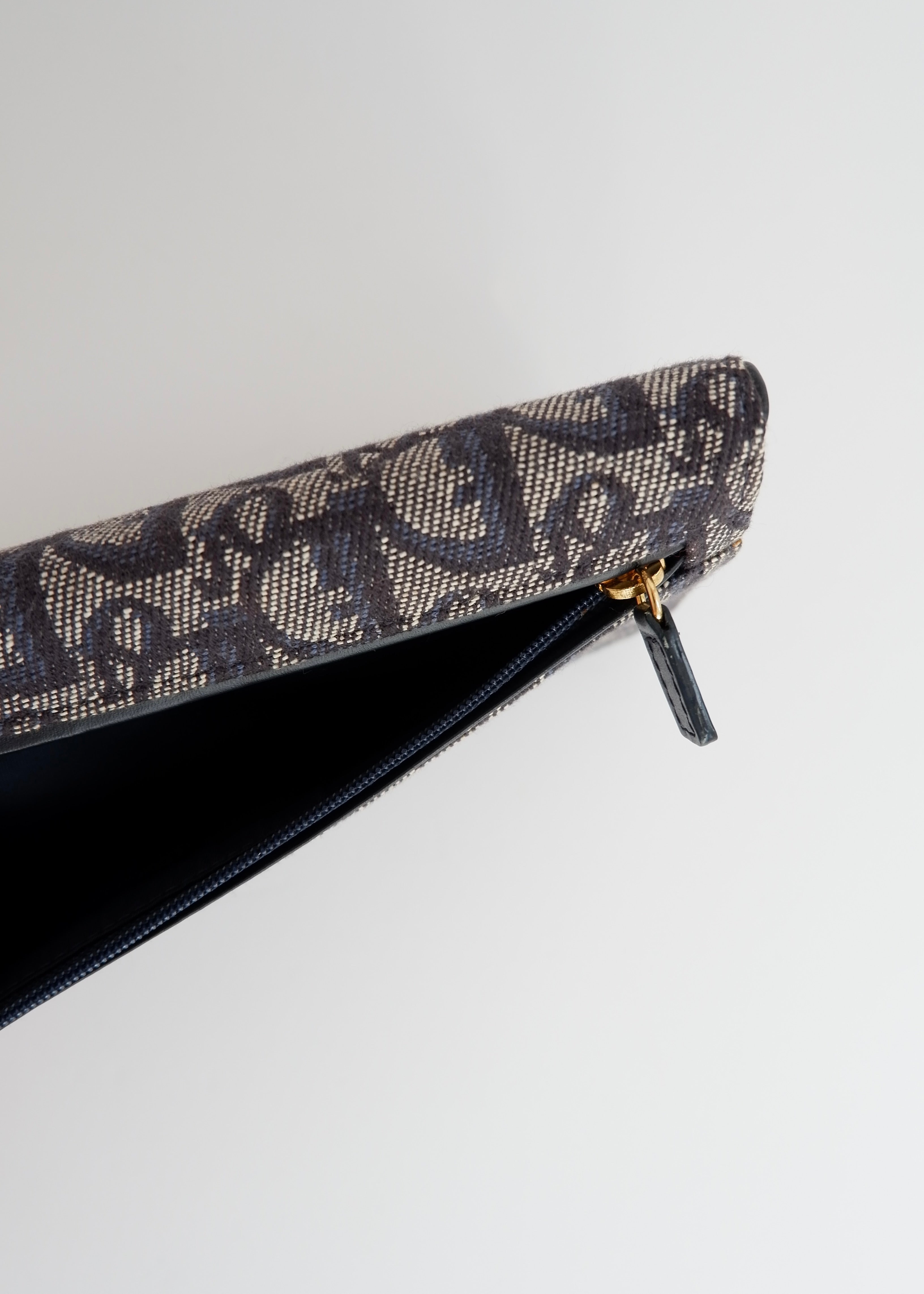 Portefeuille Dior authentique d'occasion en toile trotteur bleu marine