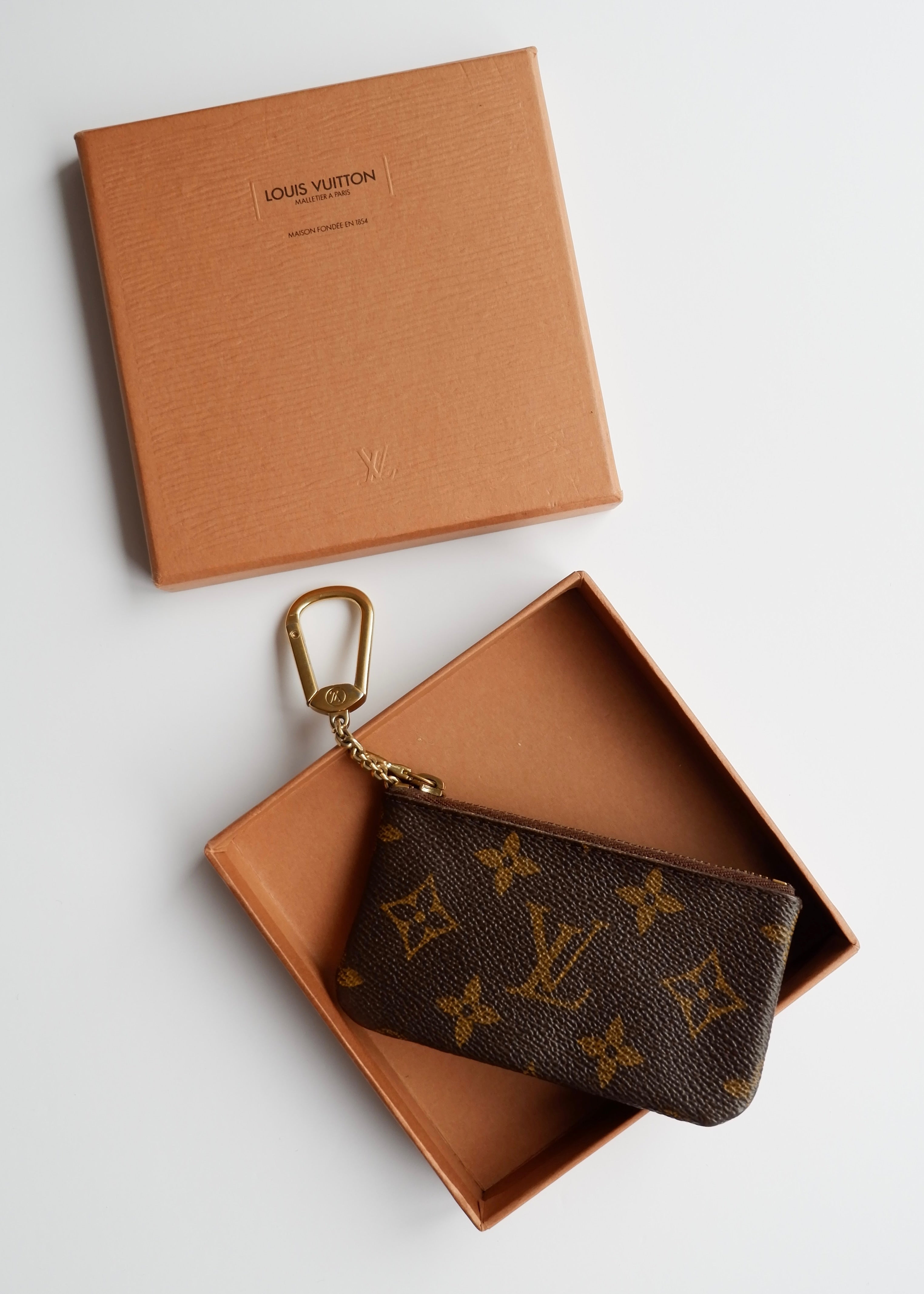 Authentique pochette à clés monogramme Louis Vuitton d'occasion