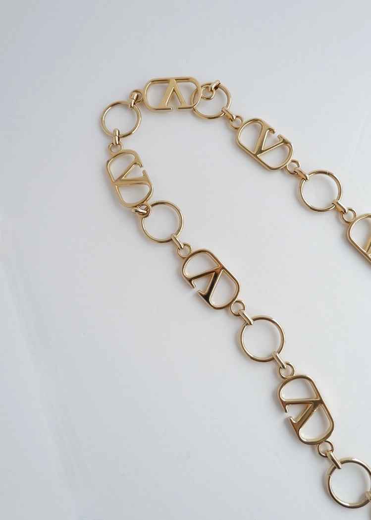 Ceinture à chaîne dorée Valentino, authentique et d'occasion