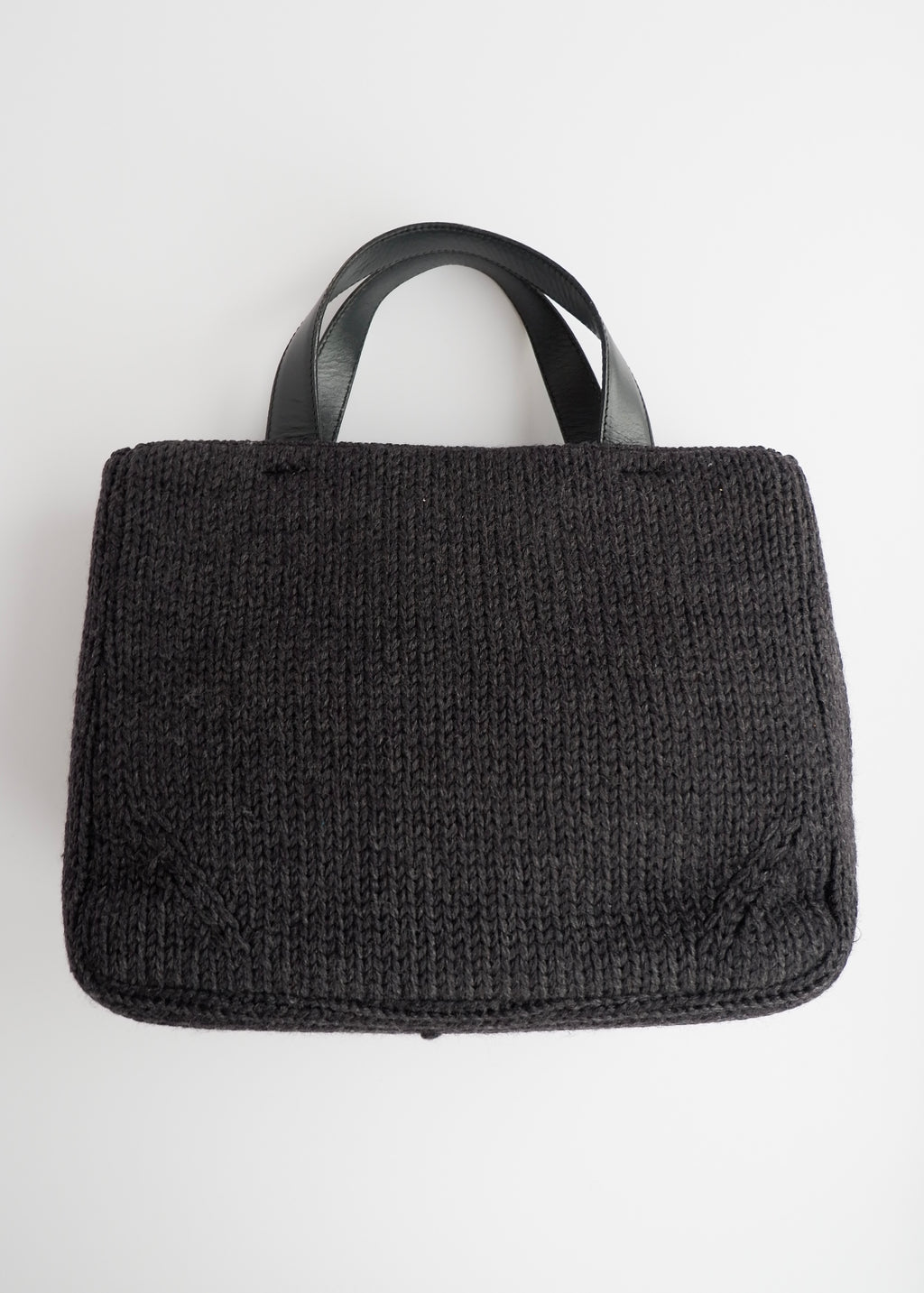 Authentique sac à main Prada en tricot et cuir noir d'occasion