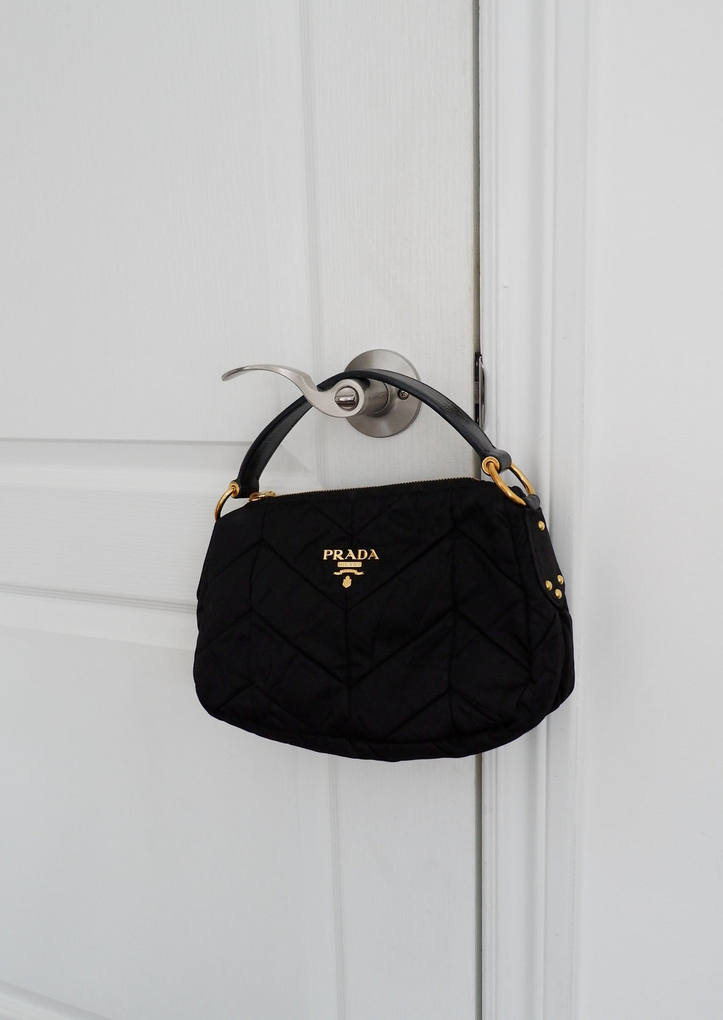 Sac à main Prada Tessuto noir en nylon d'occasion authentique