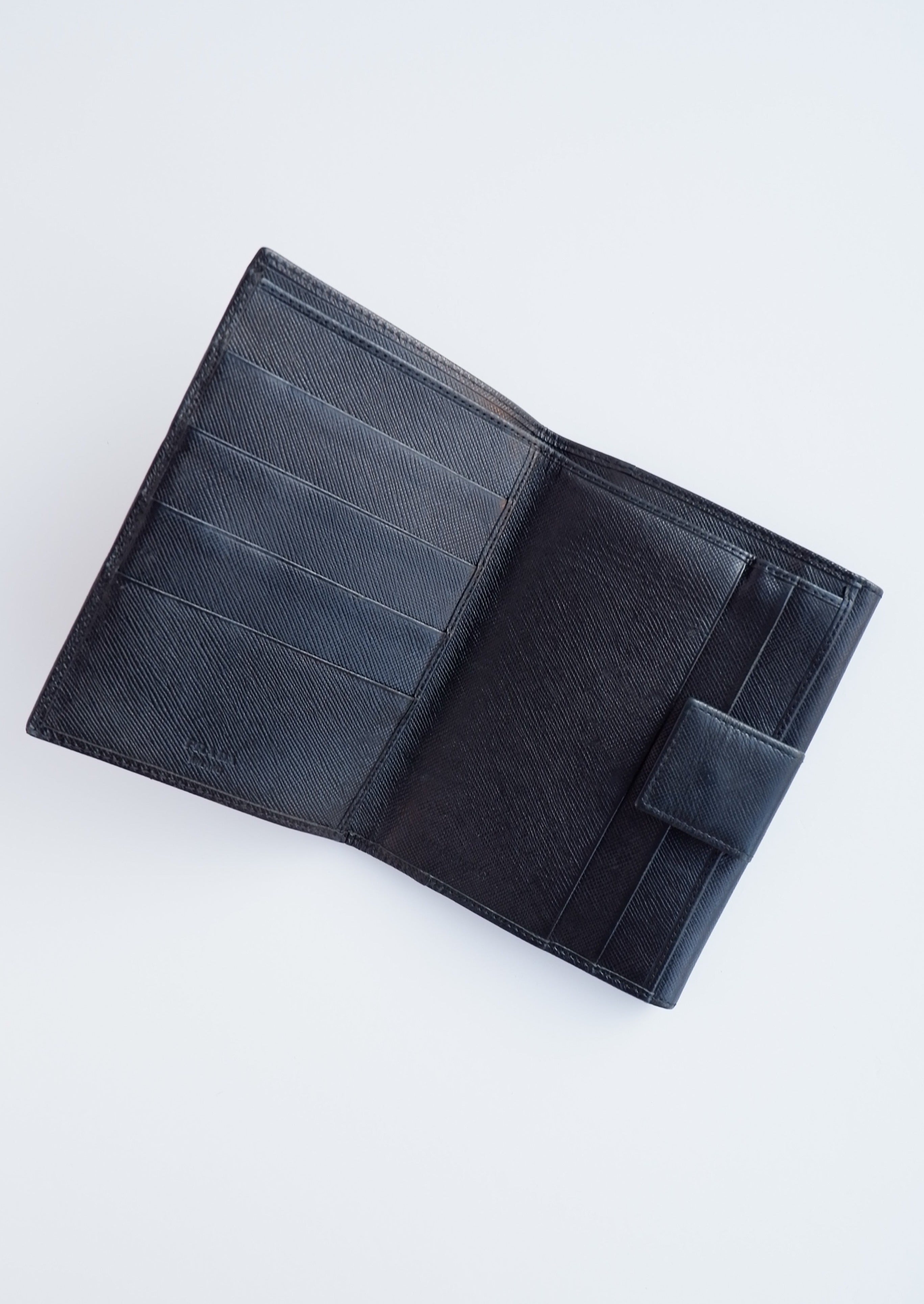 Portefeuille Prada en cuir noir, d'occasion, authentique, à deux volets