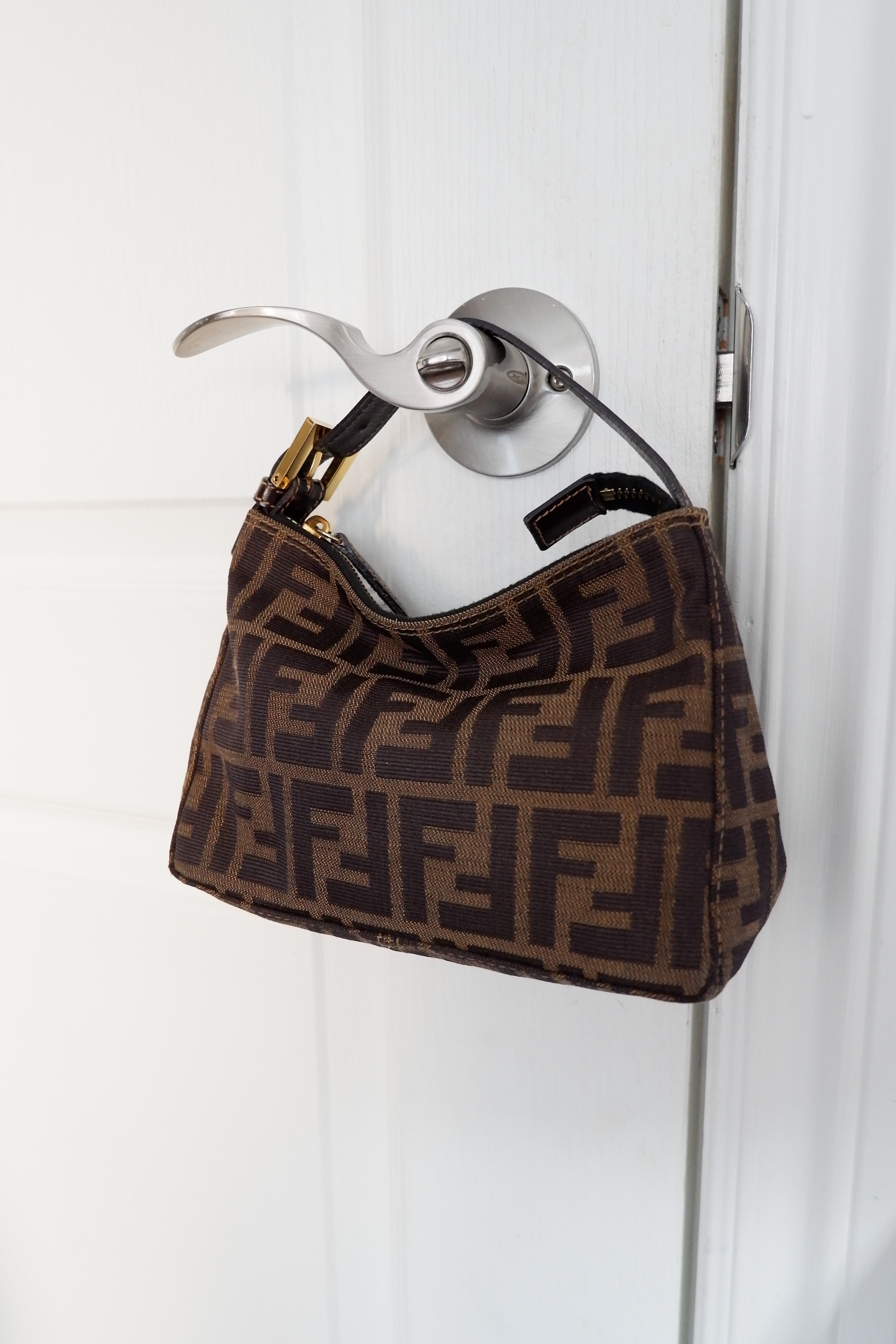 Authentique sac pochette Fendi Zucca d'occasion
