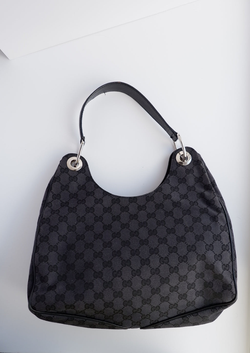 Authentique Sac à bandoulière Gucci en toile GG noire d'occasion