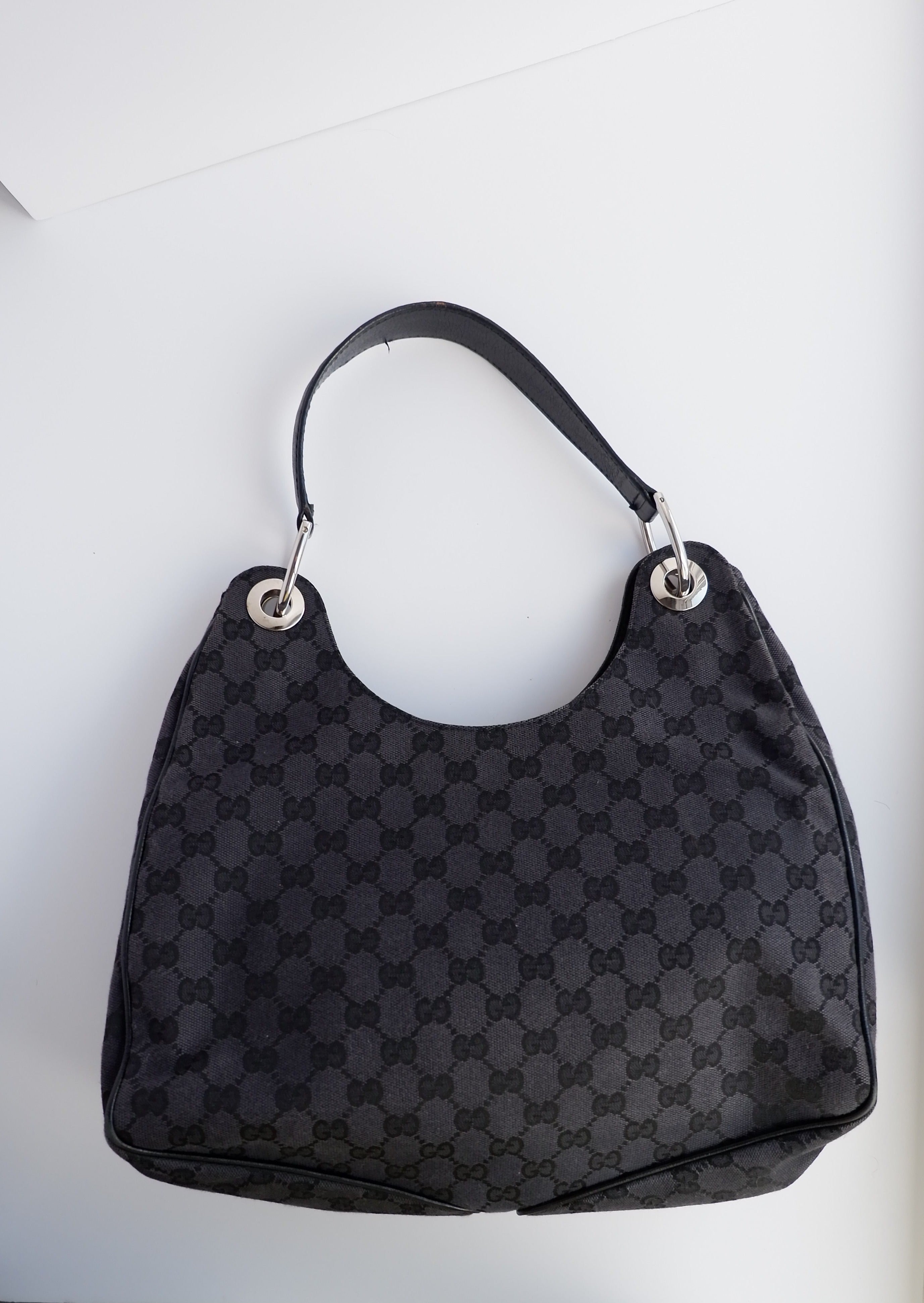 Authentique Sac à bandoulière Gucci en toile GG noire d'occasion