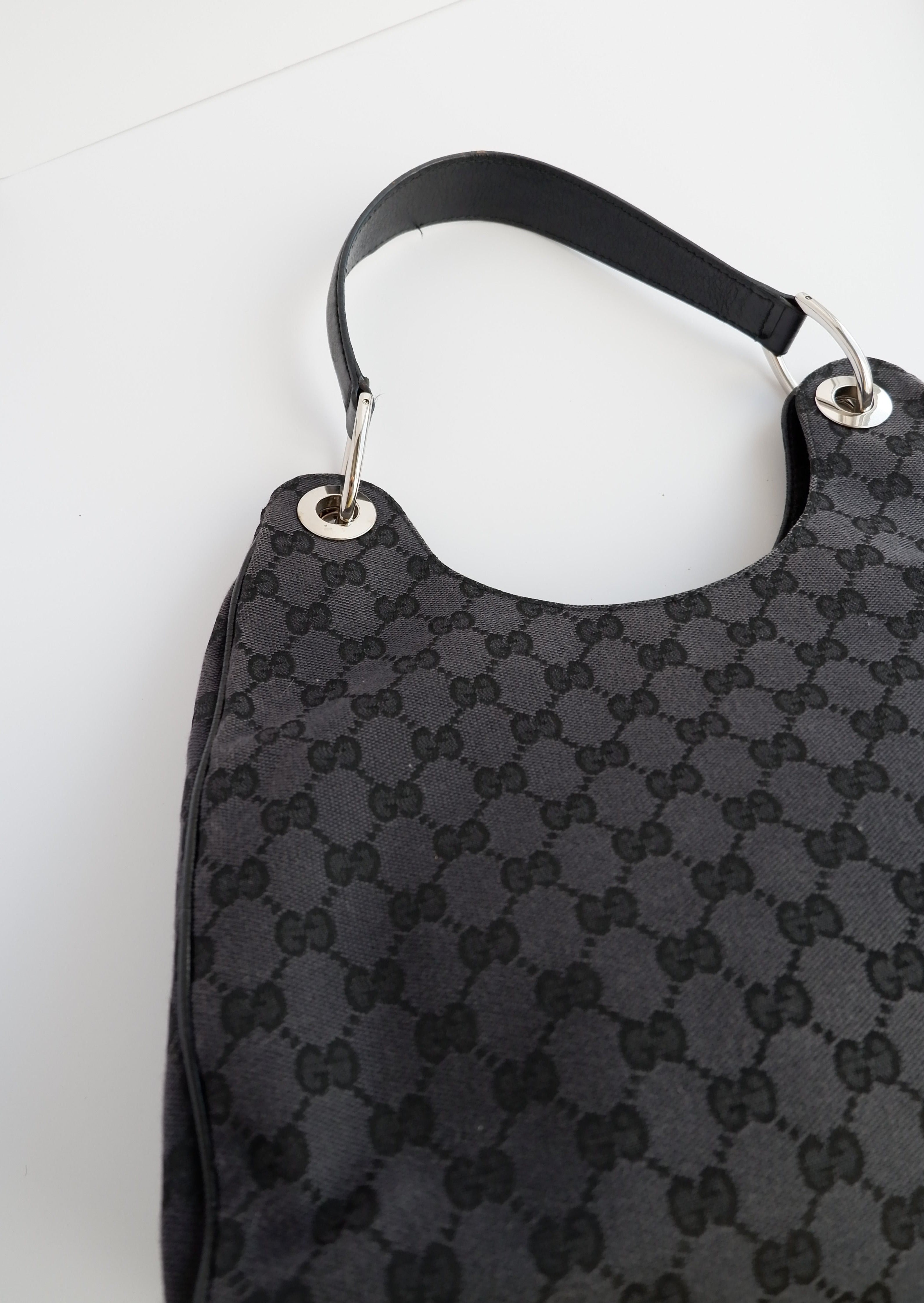 Authentique Sac à bandoulière Gucci en toile GG noire d'occasion