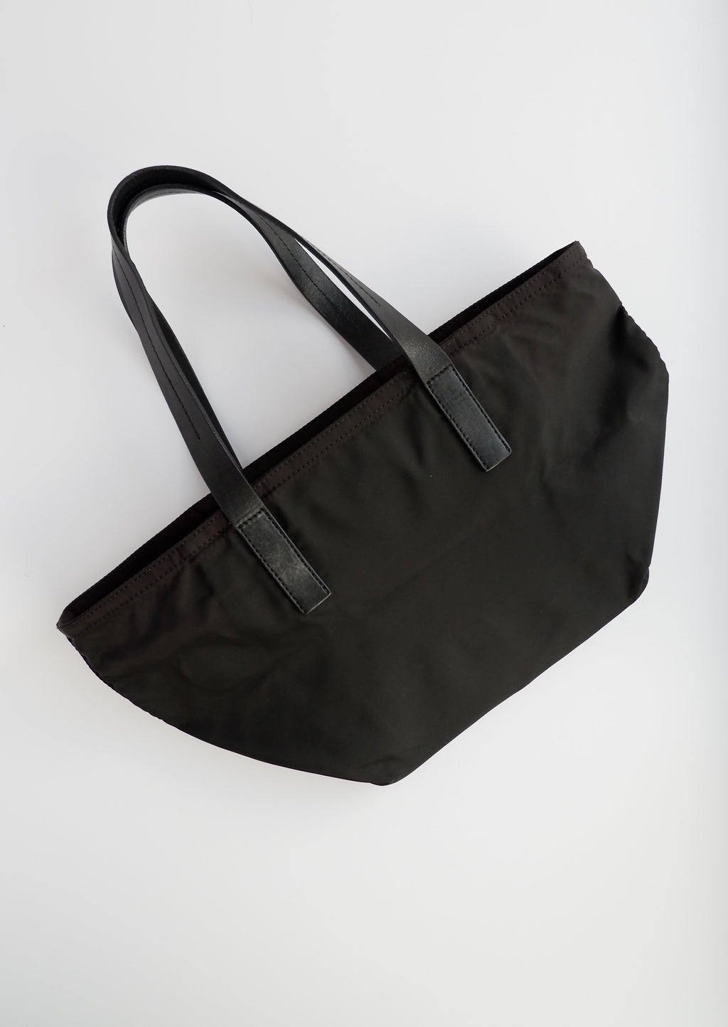 Authentique Sac Micro fourre-tout/bandoulière Prada en nylon noir d'occasion