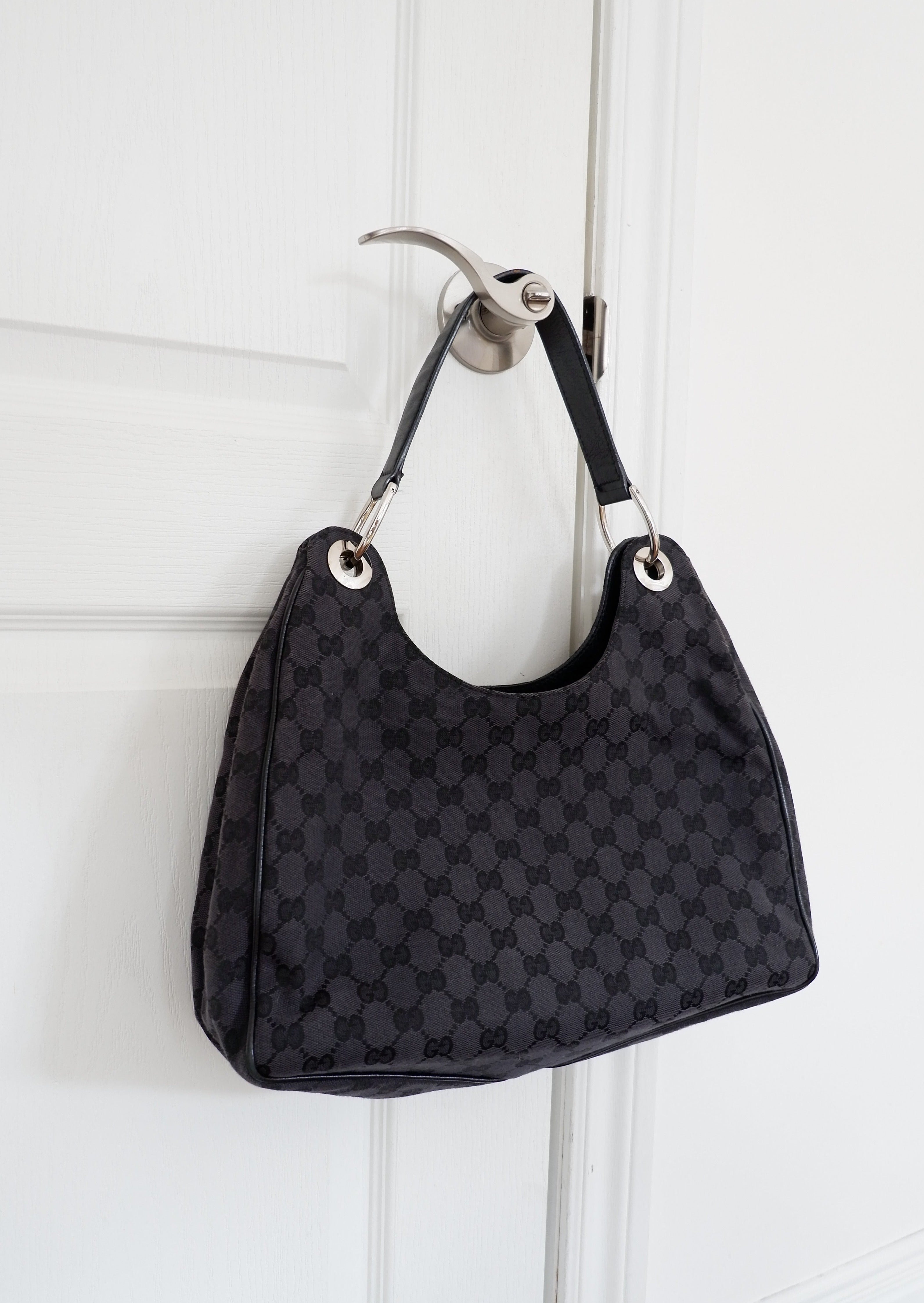 Authentique Sac à bandoulière Gucci en toile GG noire d'occasion