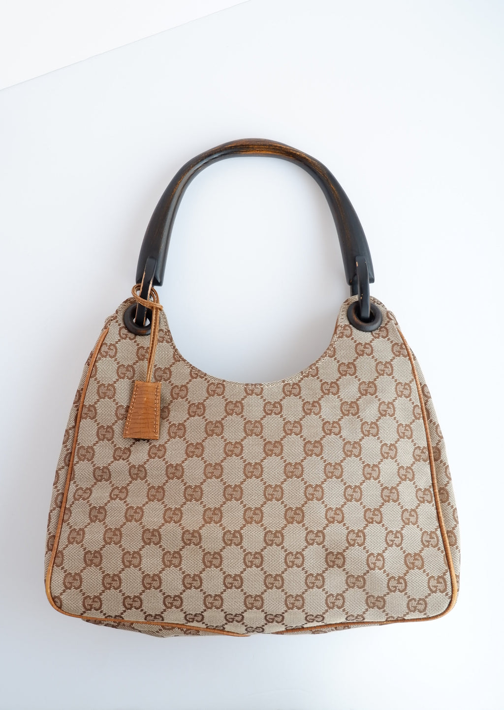 Authentique Sac à bandoulière Gucci d'occasion en toile GG avec poignée en bois