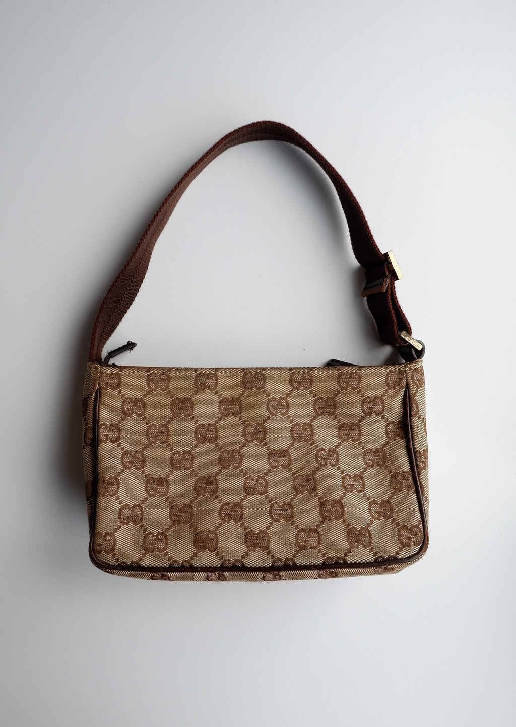 Authentique Sac bandoulière Gucci Micro en toile GG marron, d'occasion
