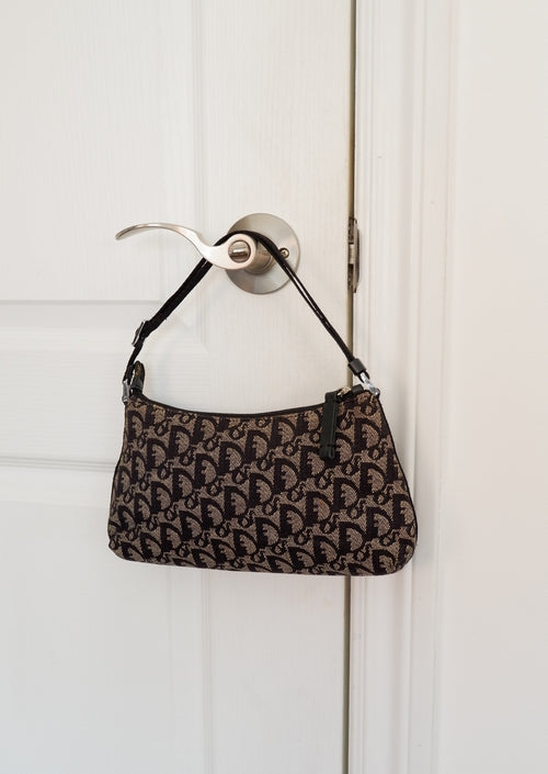 Authentique Sac à bandoulière / Pochette Diorissimo bleu marine d'occasion Dior