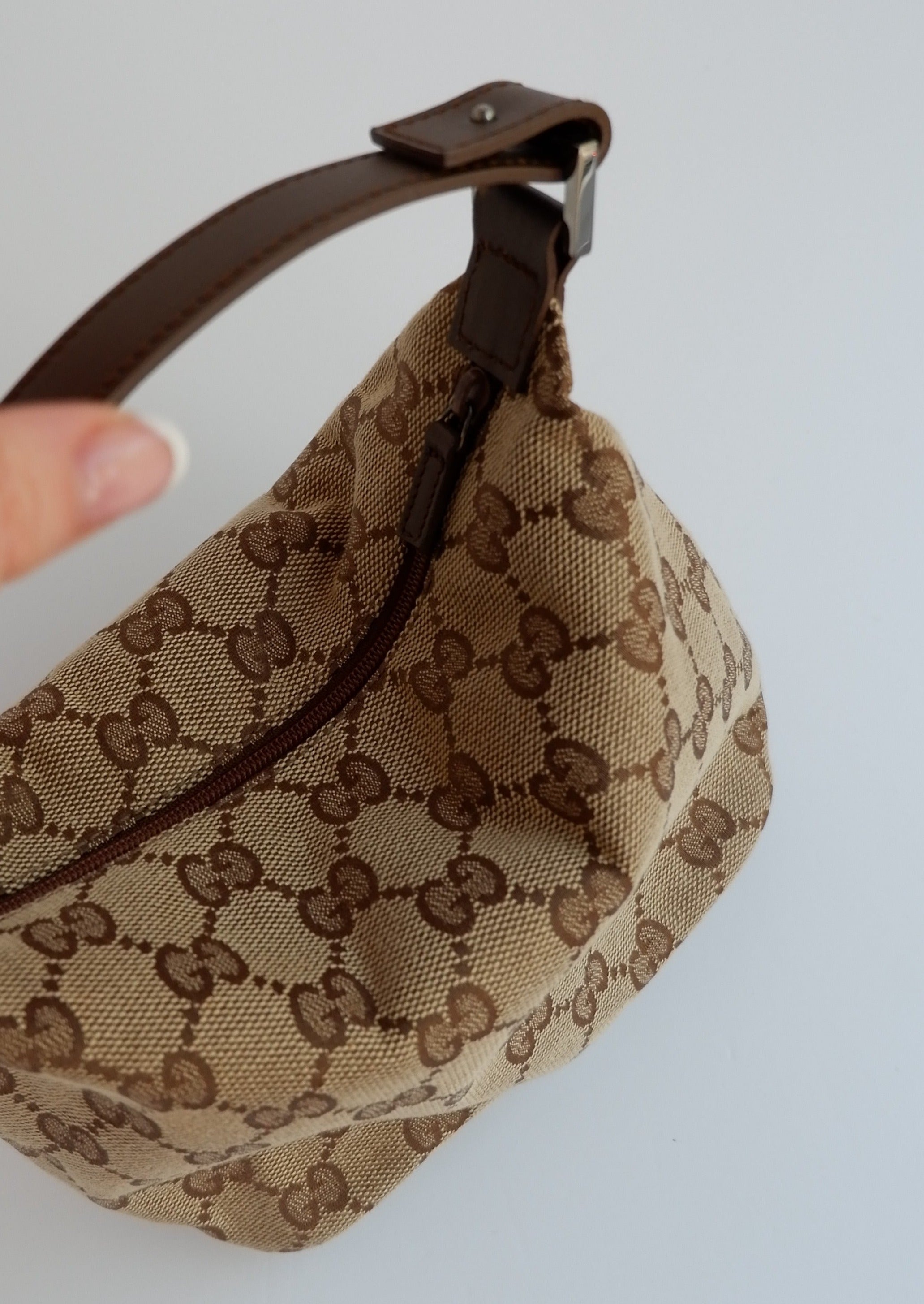 Authentique Sac Pochette Gucci en Toile GG Marron d'occasion