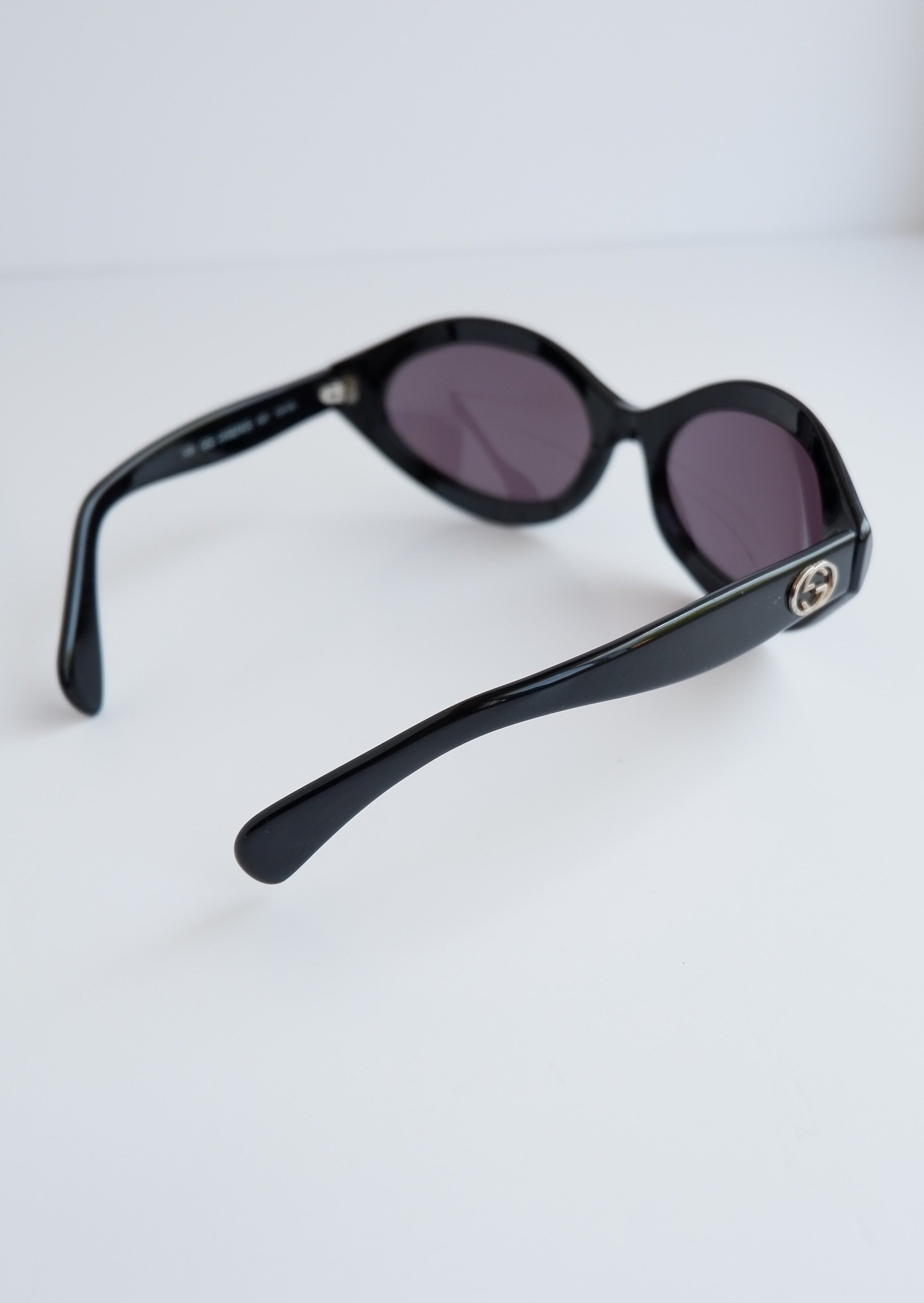 Véritables lunettes de soleil vintage Gucci d'occasion à monture ronde noire