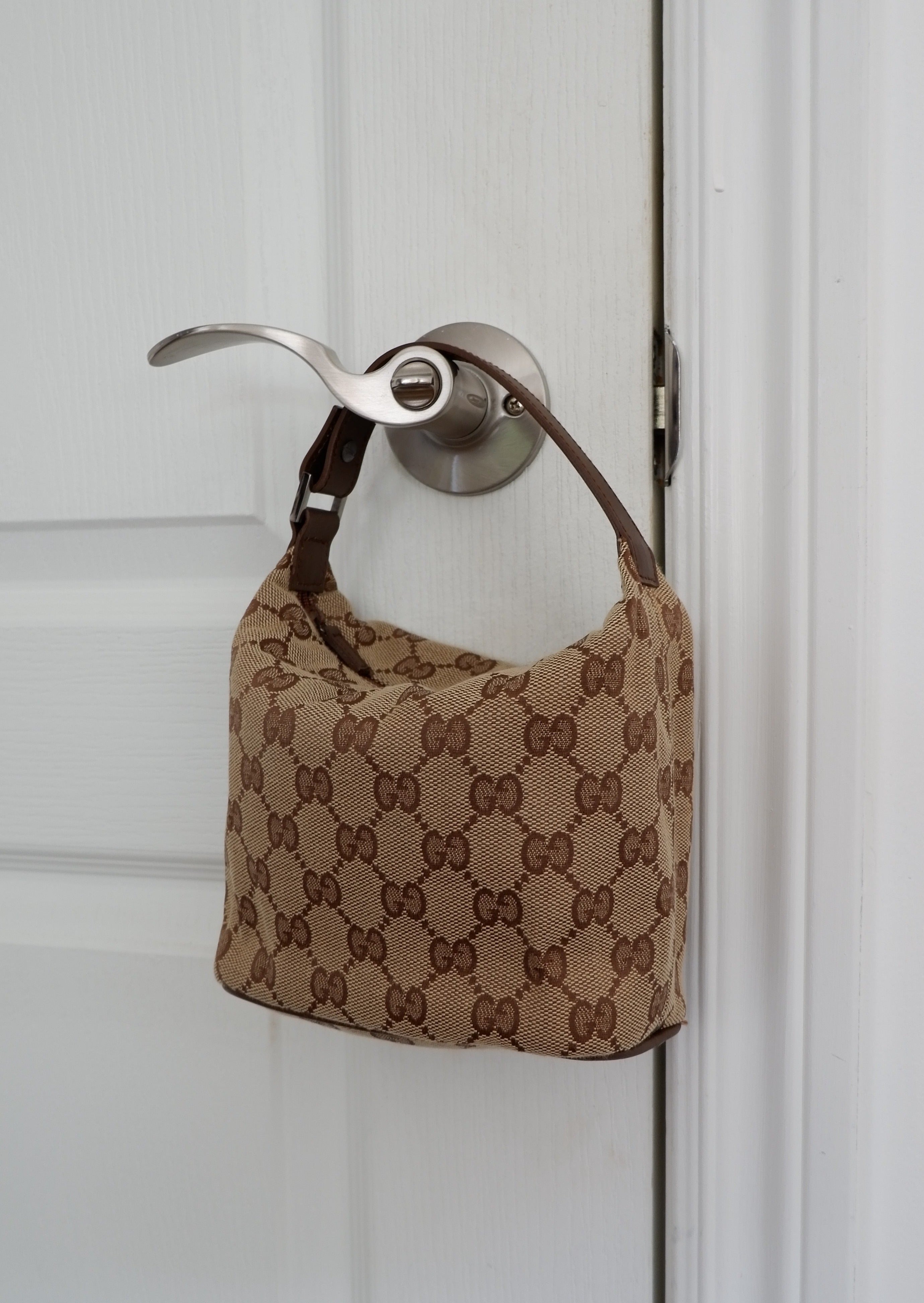 Authentique Sac Pochette Gucci en Toile GG Marron d'occasion