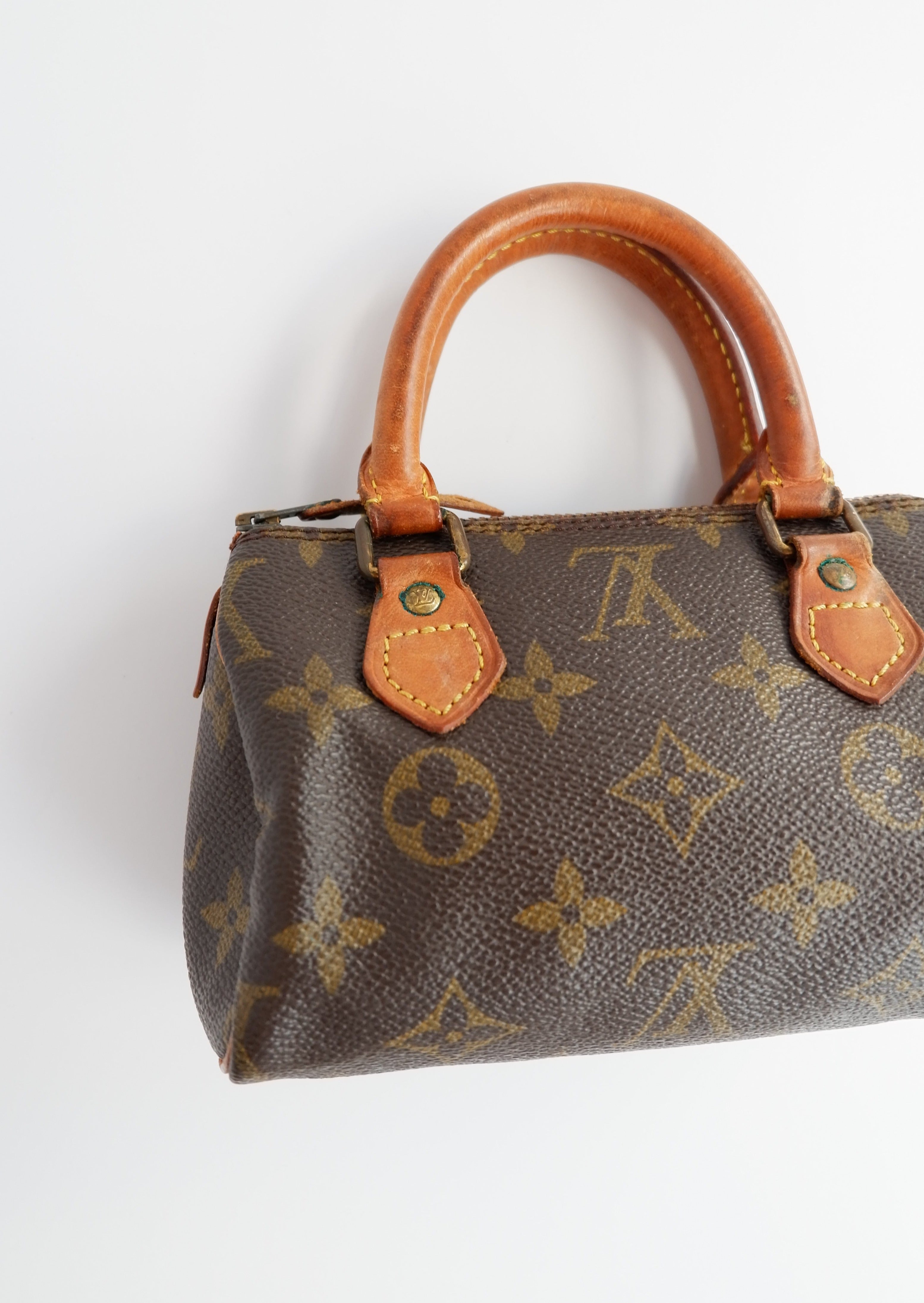 Sac Louis Vuitton Speedy Mini Monogram authentique d'occasion (bandoulière)