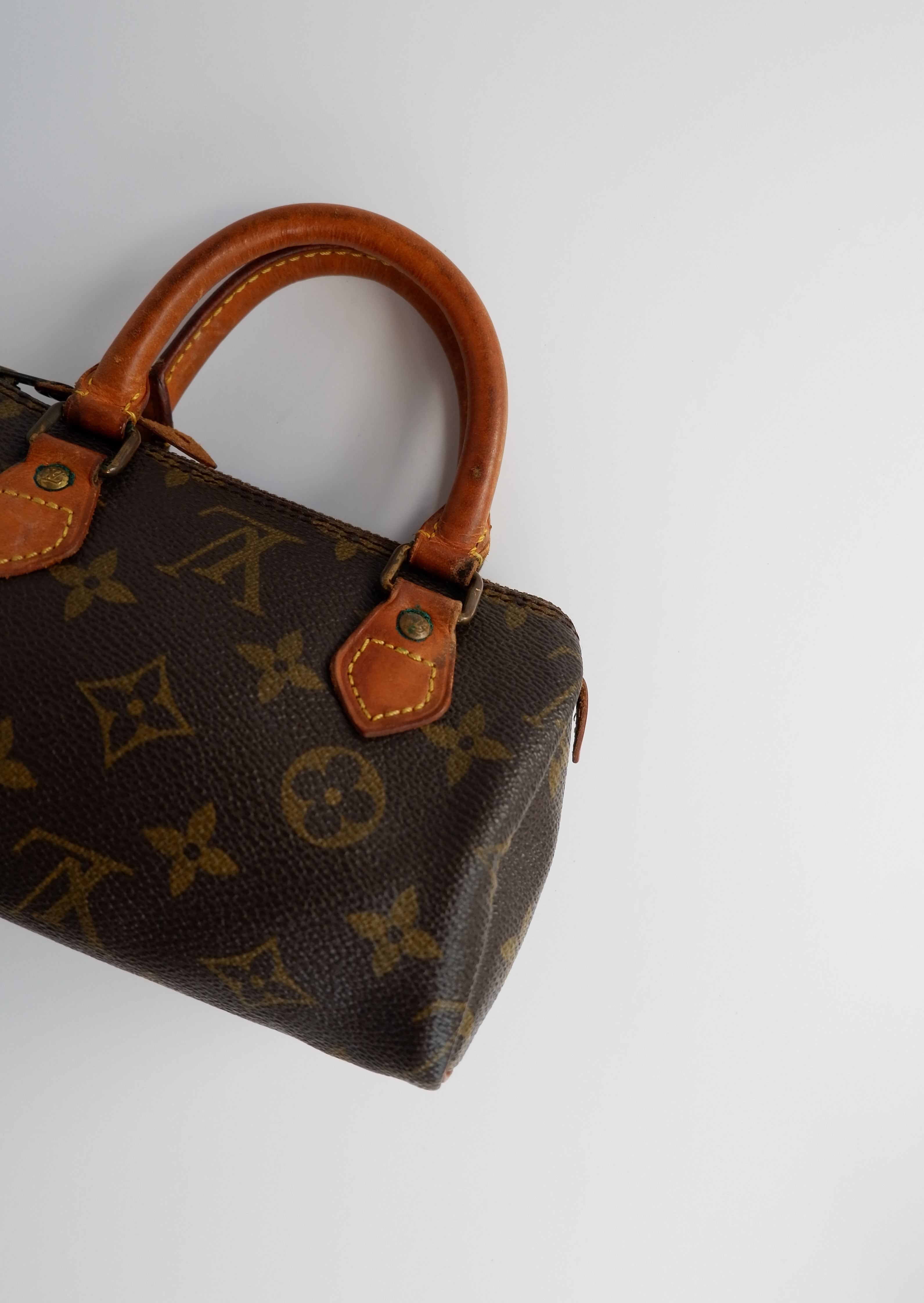 Sac Louis Vuitton Speedy Mini Monogram authentique d'occasion (bandoulière)