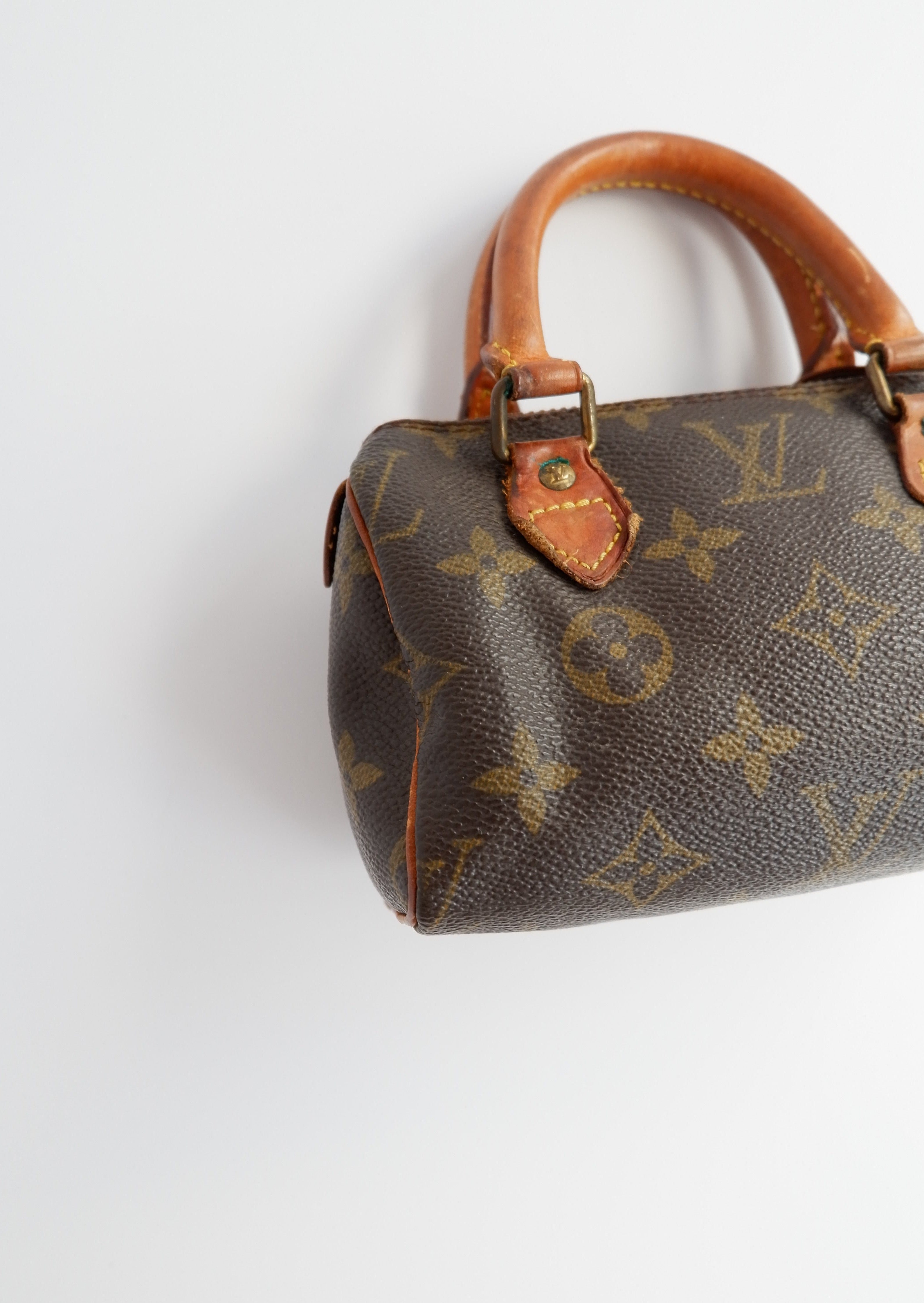 Sac Louis Vuitton Speedy Mini Monogram authentique d'occasion (bandoulière)
