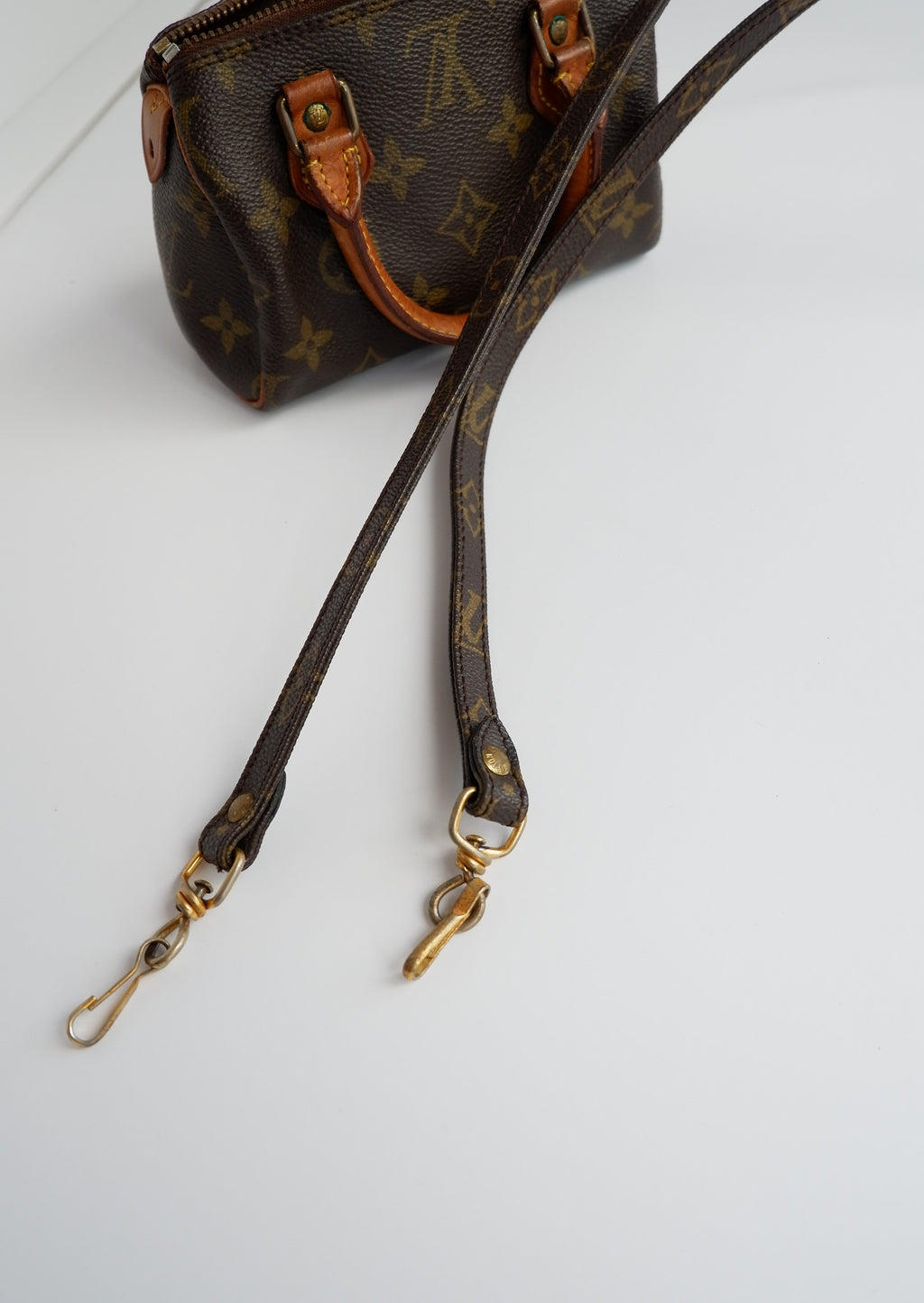 Sac Louis Vuitton Speedy Mini Monogram authentique d'occasion (bandoulière)