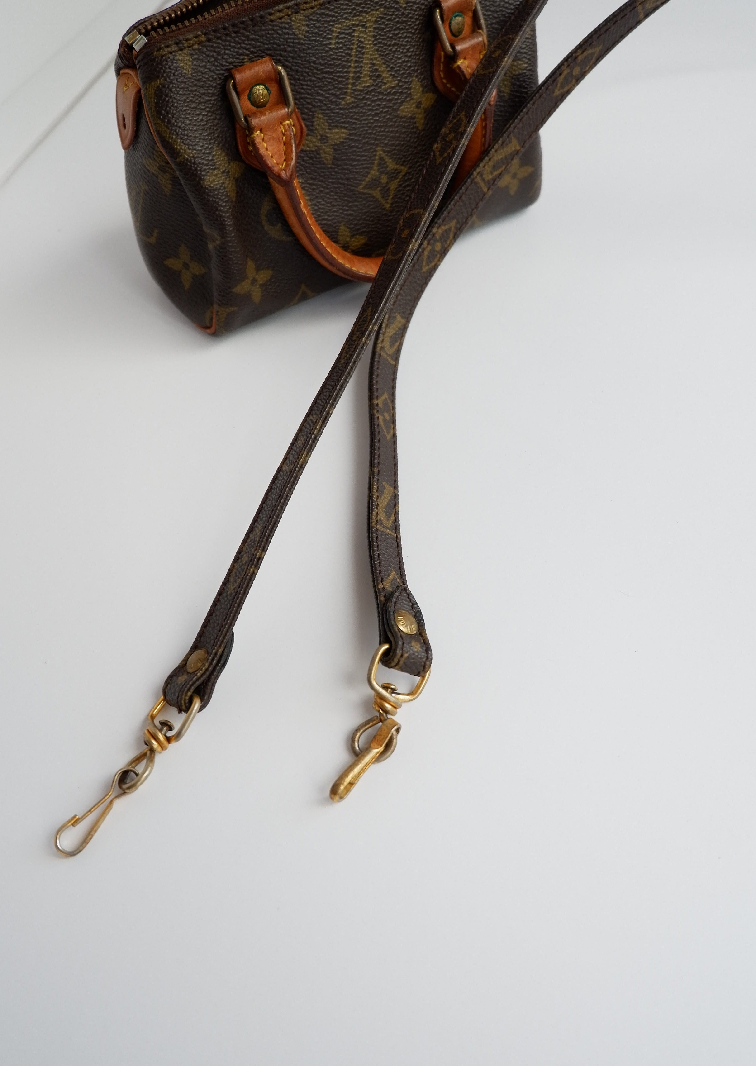 Sac Louis Vuitton Speedy Mini Monogram authentique d'occasion (bandoulière)
