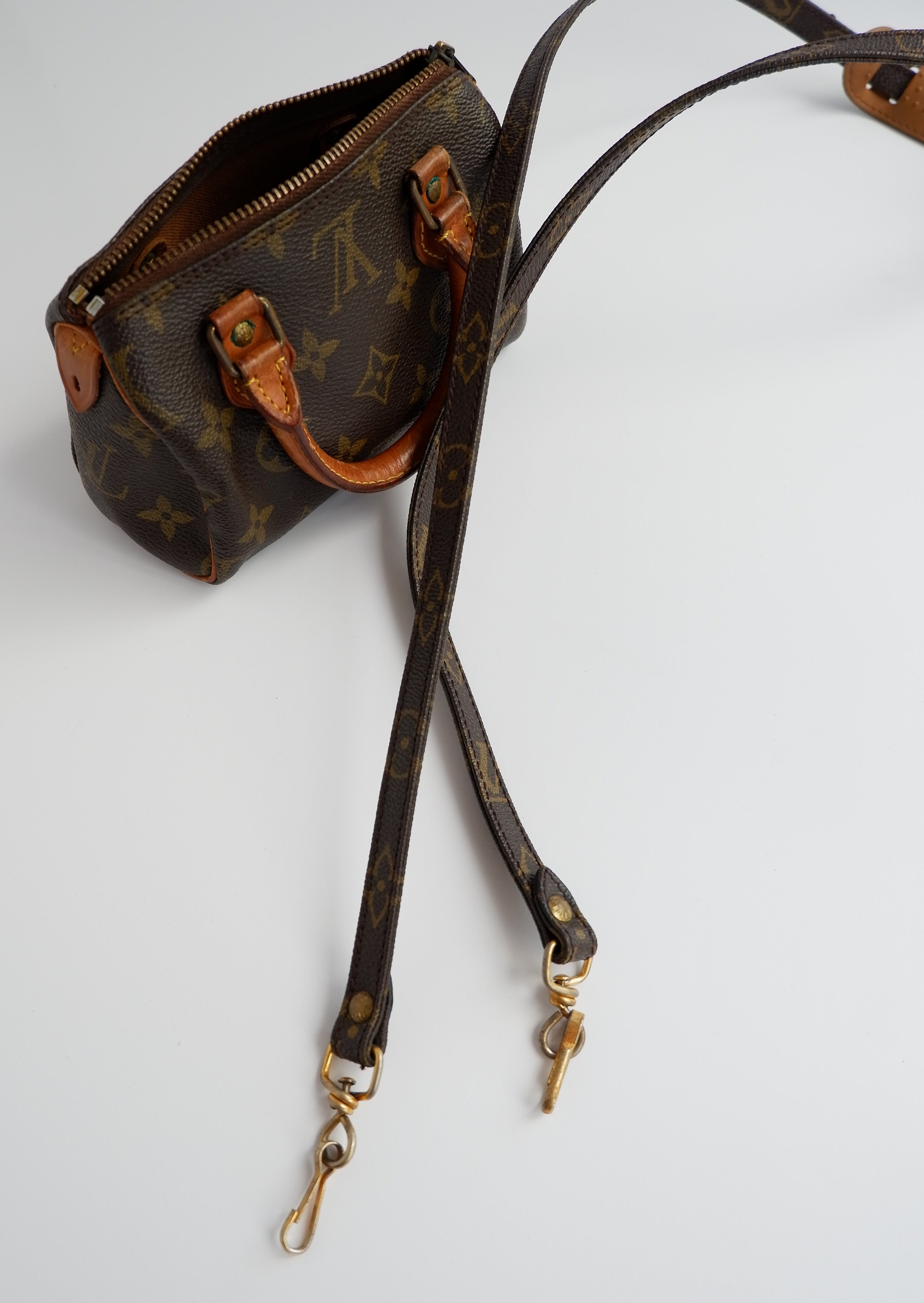 Sac Louis Vuitton Speedy Mini Monogram authentique d'occasion (bandoulière)