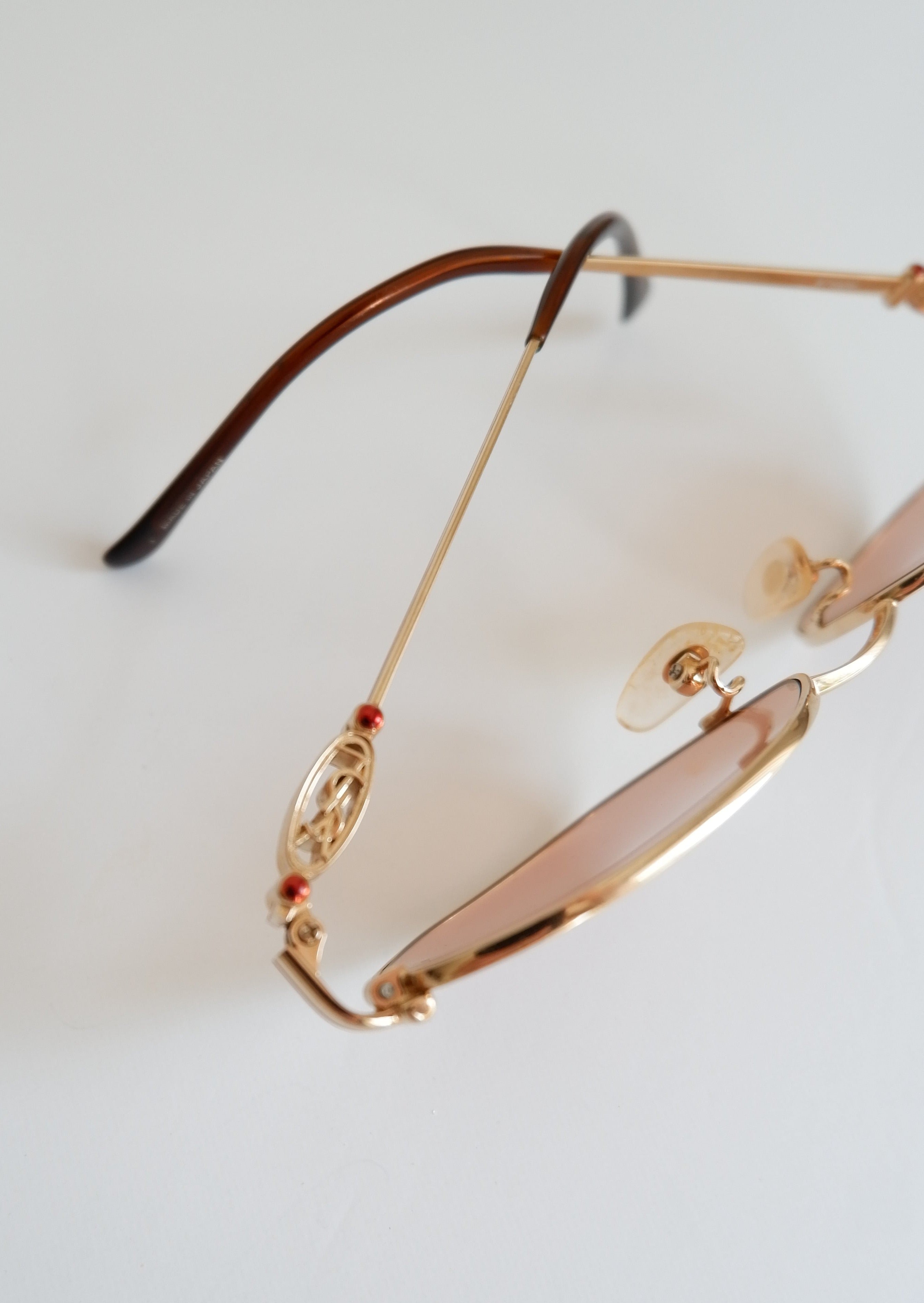 Lunettes de soleil Saint Laurent YSL authentiques d'occasion, monture métallique, vintage