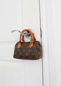 Sac Louis Vuitton Speedy Mini Monogram authentique d'occasion (bandoulière)