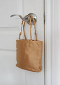 Mini sac à main Prada authentique d'occasion en satin doré